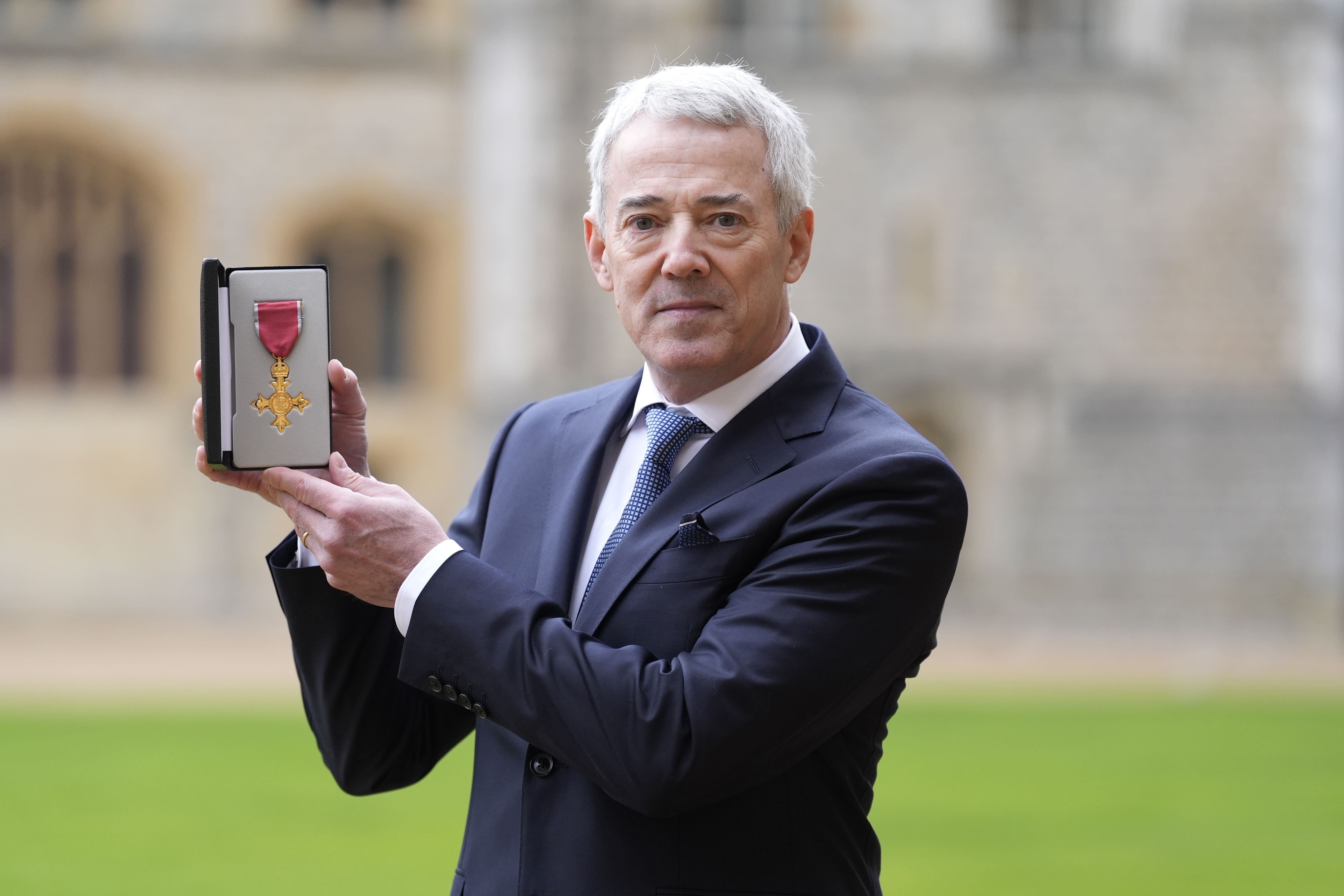 David Mearns, a marine scientist and oceanographer, after being made an Officer of the Order of the British Empire (OBE) by the Prince of Wales at an Investiture ceremony at Windsor Castle, Berkshire (Andrew Matthews/PA)