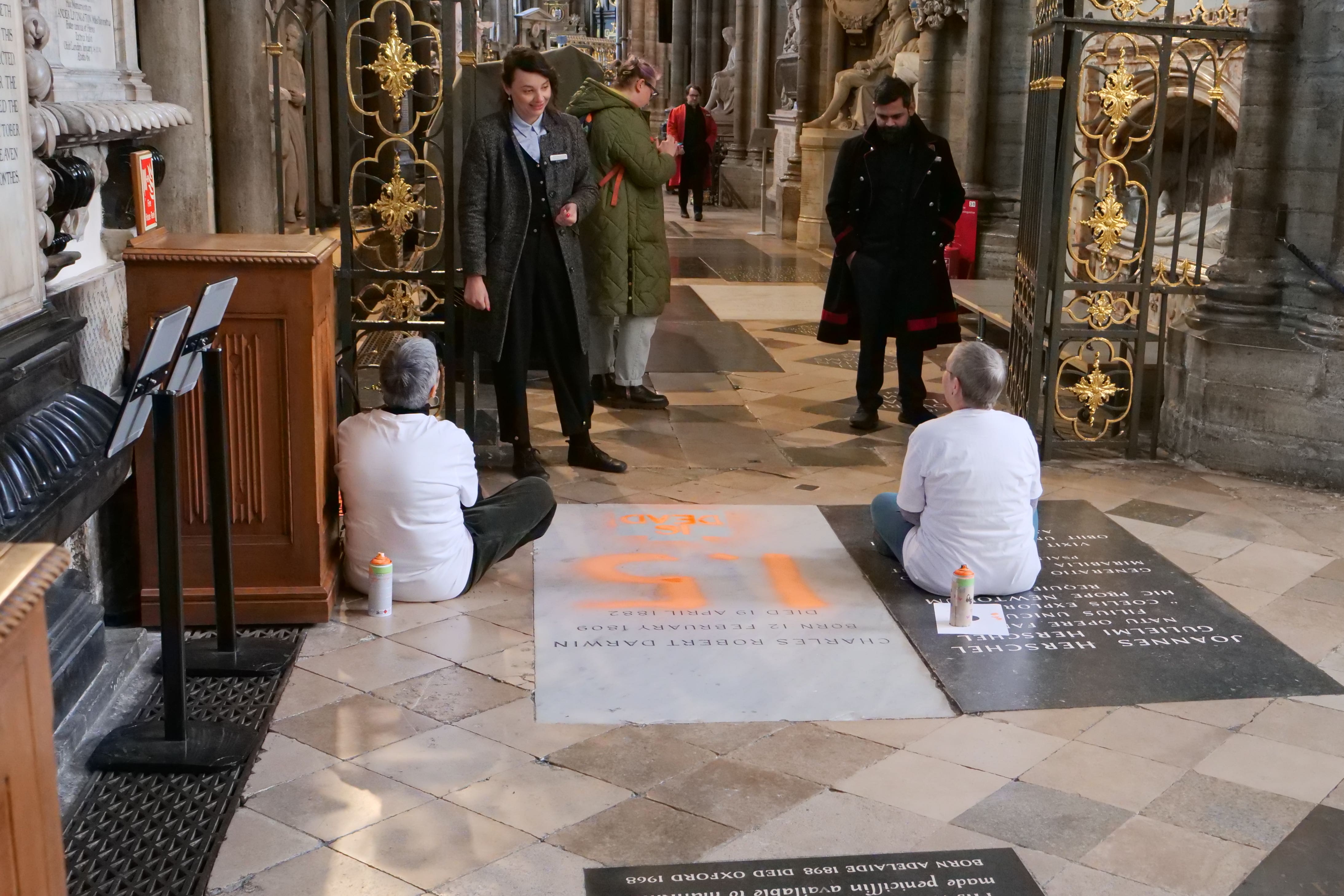The grave of Charles Darwin, in the north aisle of the nave of Westminster Abbey (Just Stop Oil)