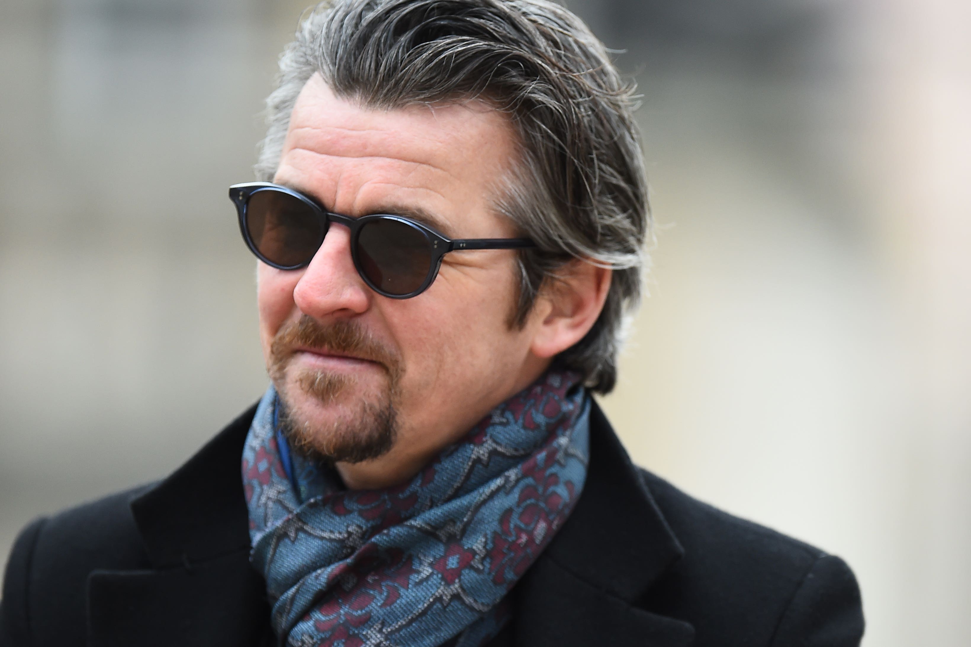 Joey Barton arrives at Liverpool Crown Court, where he is charged with sending offensive messages to commentator Lucy Ward and TV presenter Jeremy Vine (Peter Powell/PA)
