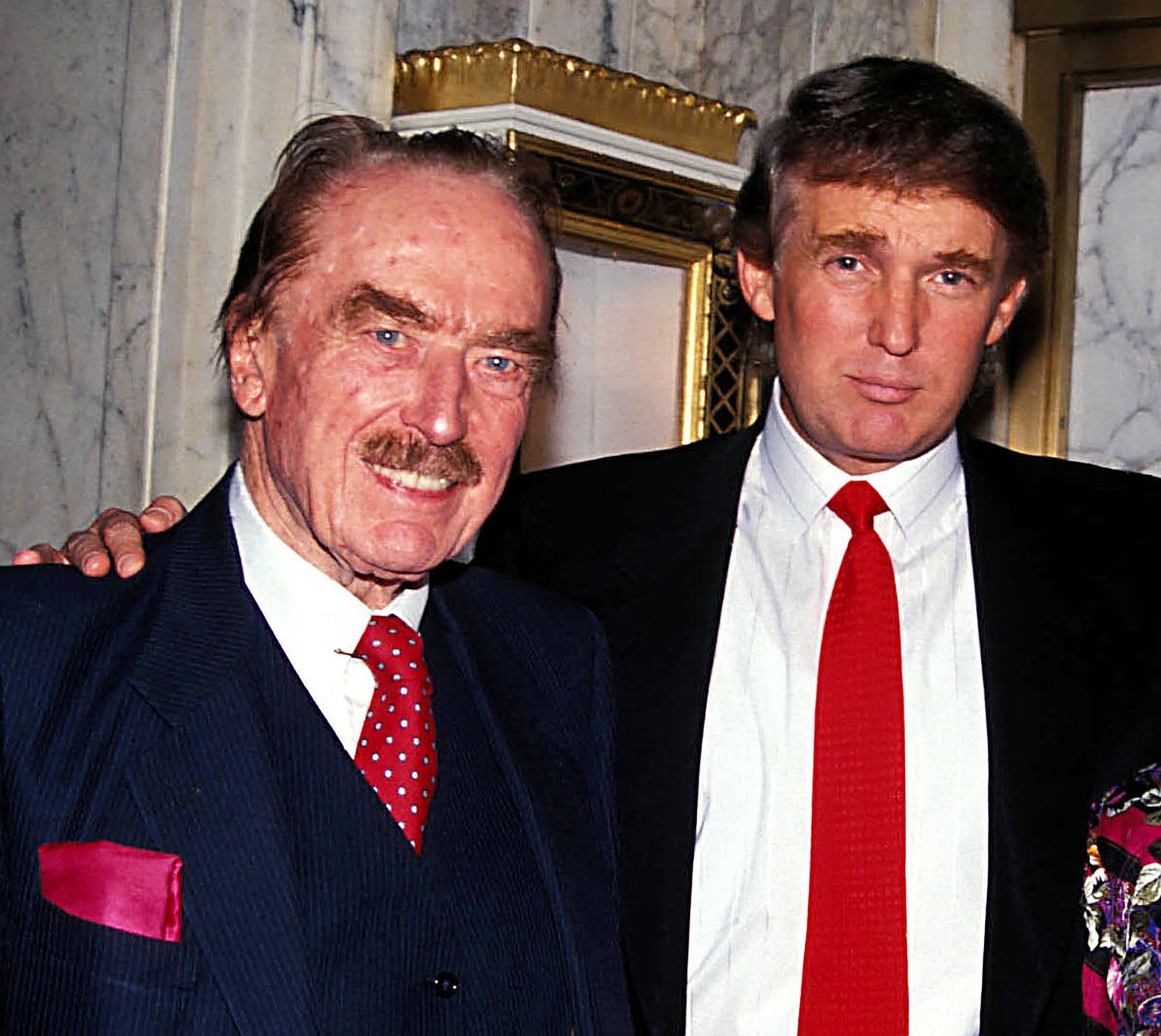 Donald Trump and his businessman father, Fred, pictured in 1992