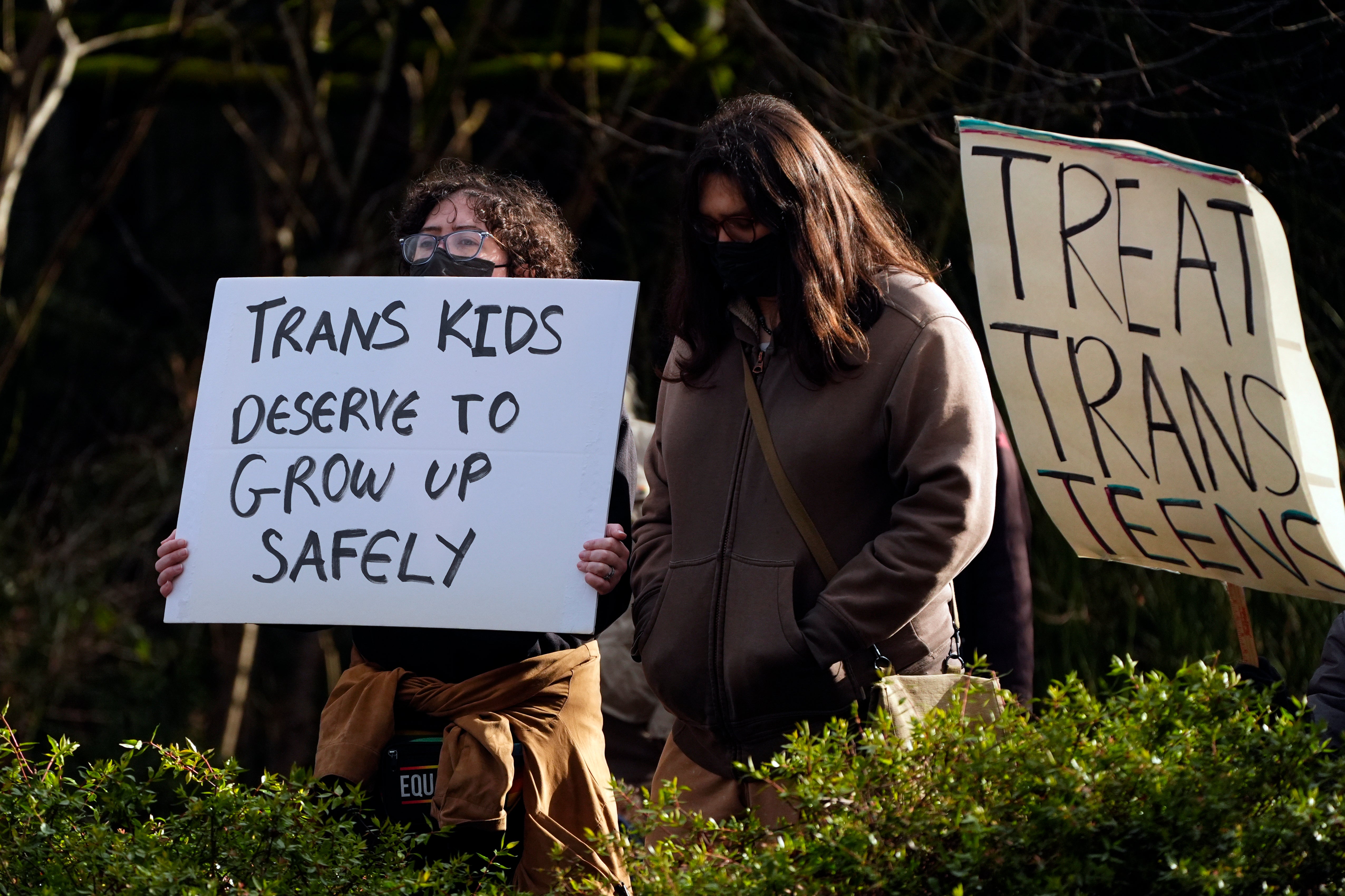 Protestors outside of Seattle Children's Hospital after it postponed some gender-affirming surgeries for minors following Trump’s order