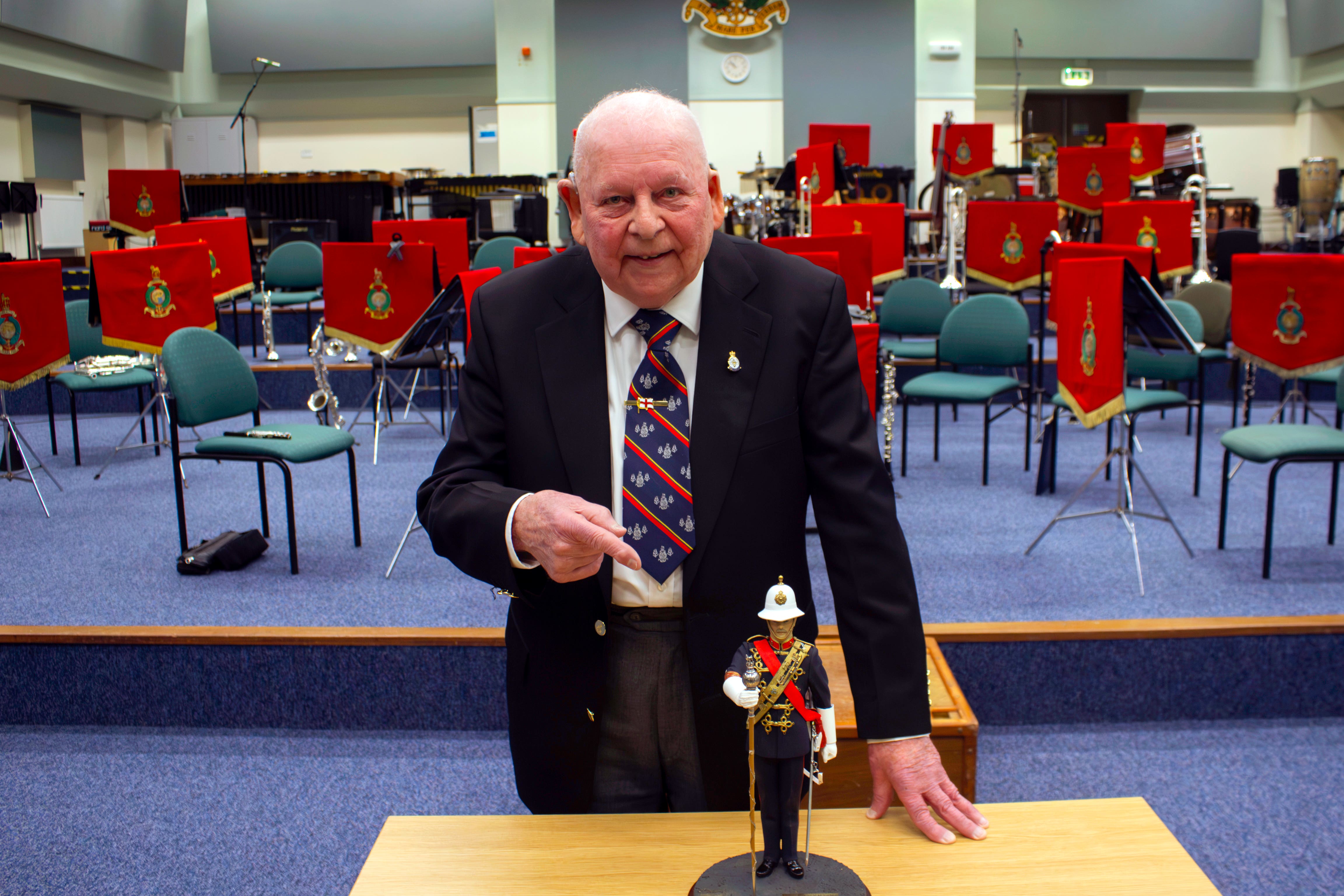 Former Royal Marines Musician George Latham with his treasured statue (Ministry of Defence/Crown Copyright/PA)