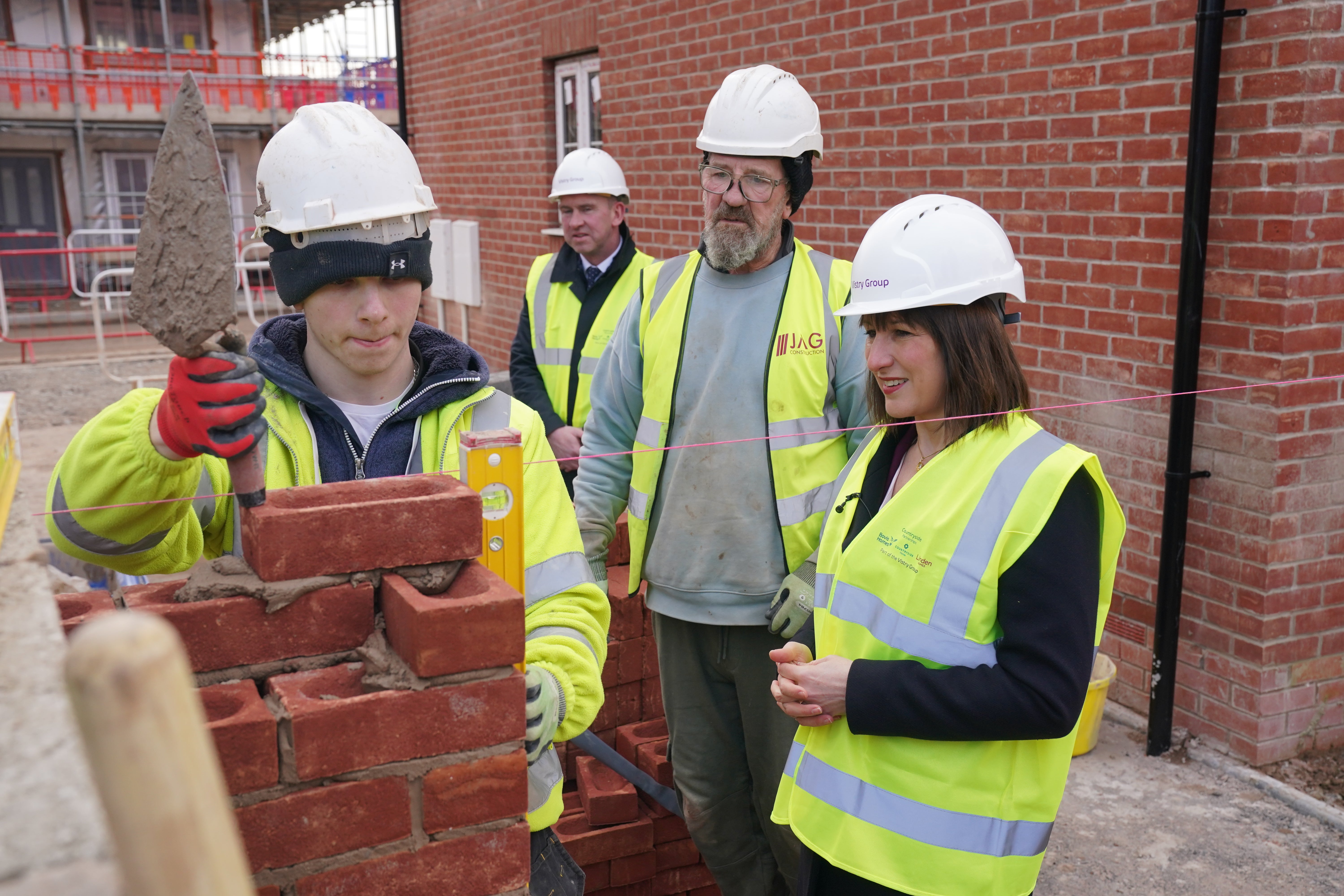 <p>Hi-vis for high targets: Rachel Reeves on a building site in Nottingham earlier this year</p>