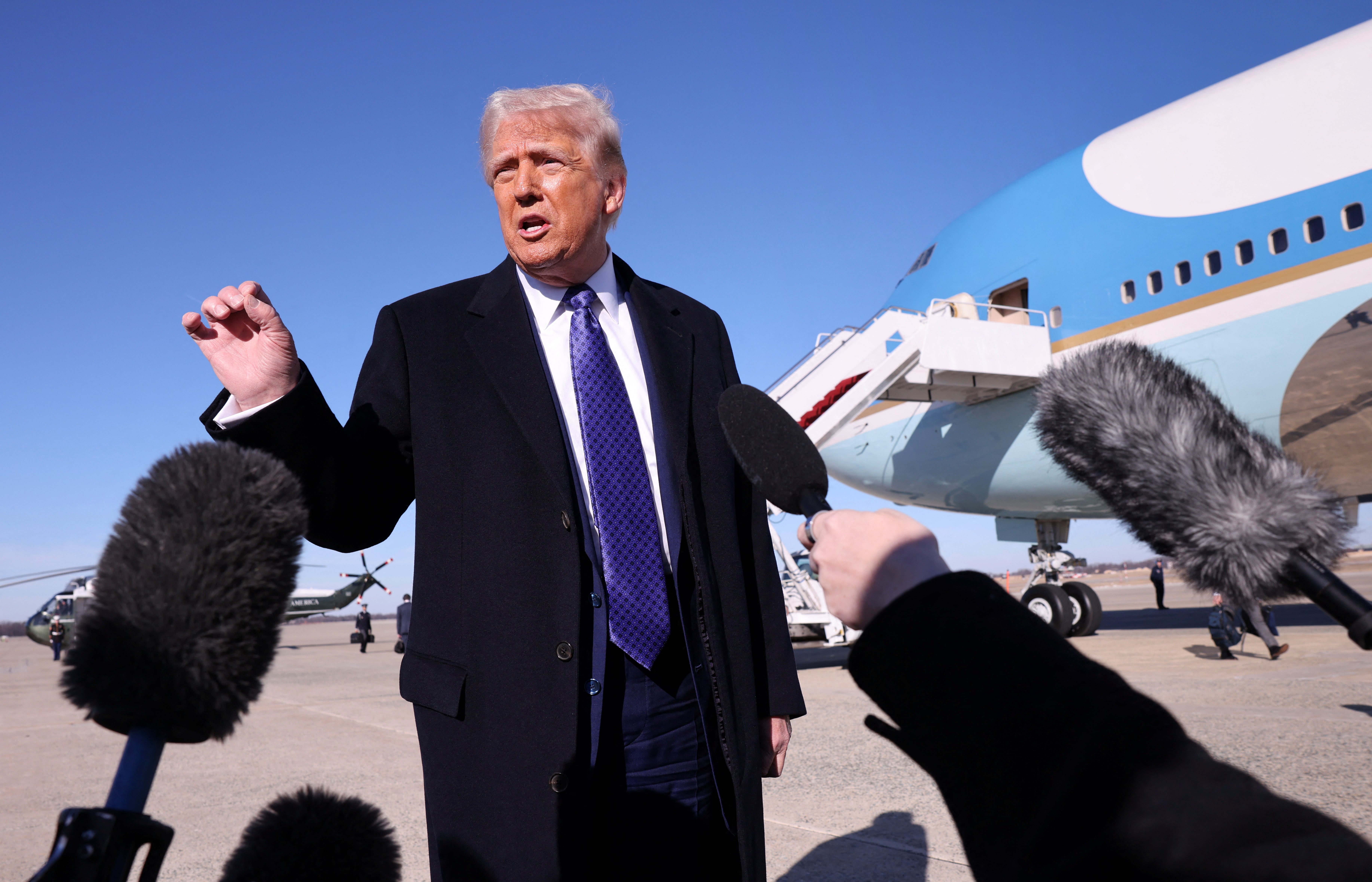 <p>President Donald Trump speaks to reporters upon departure from Joint Base Andrews in Maryland</p>