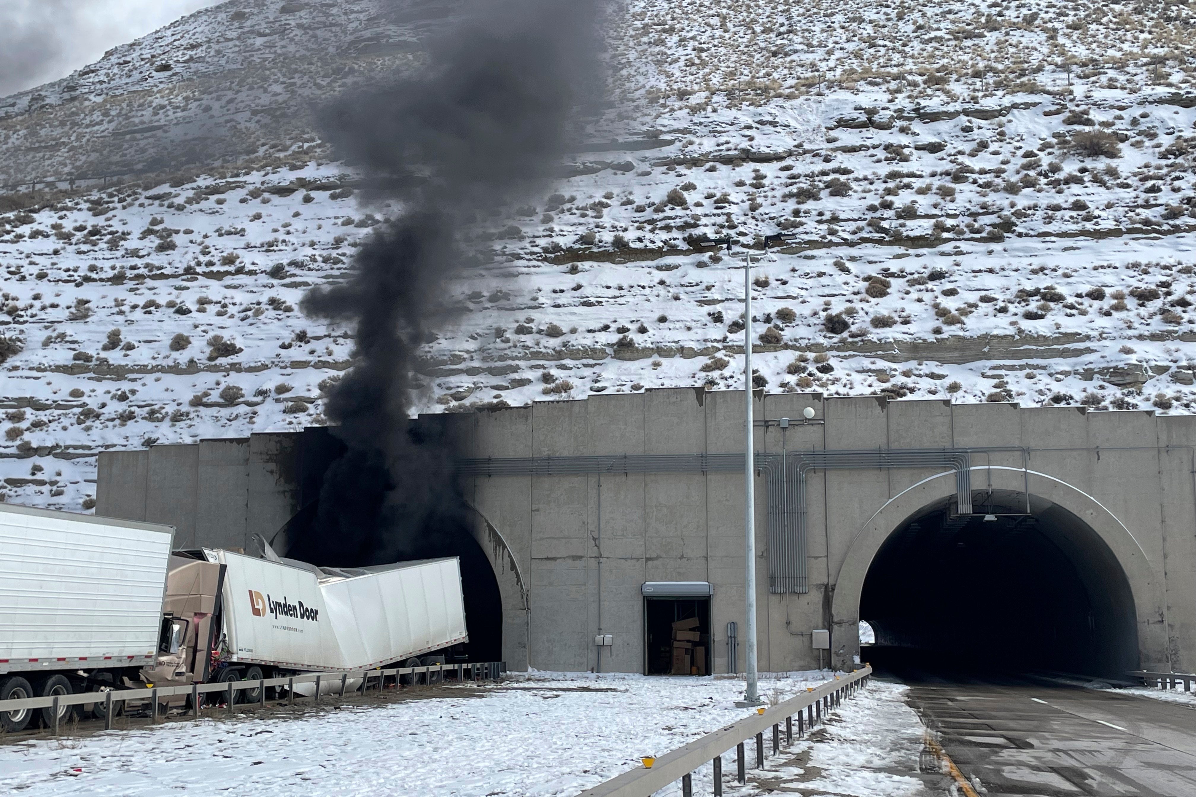 Smoke billows from the tunnel at Green River, Wyoming