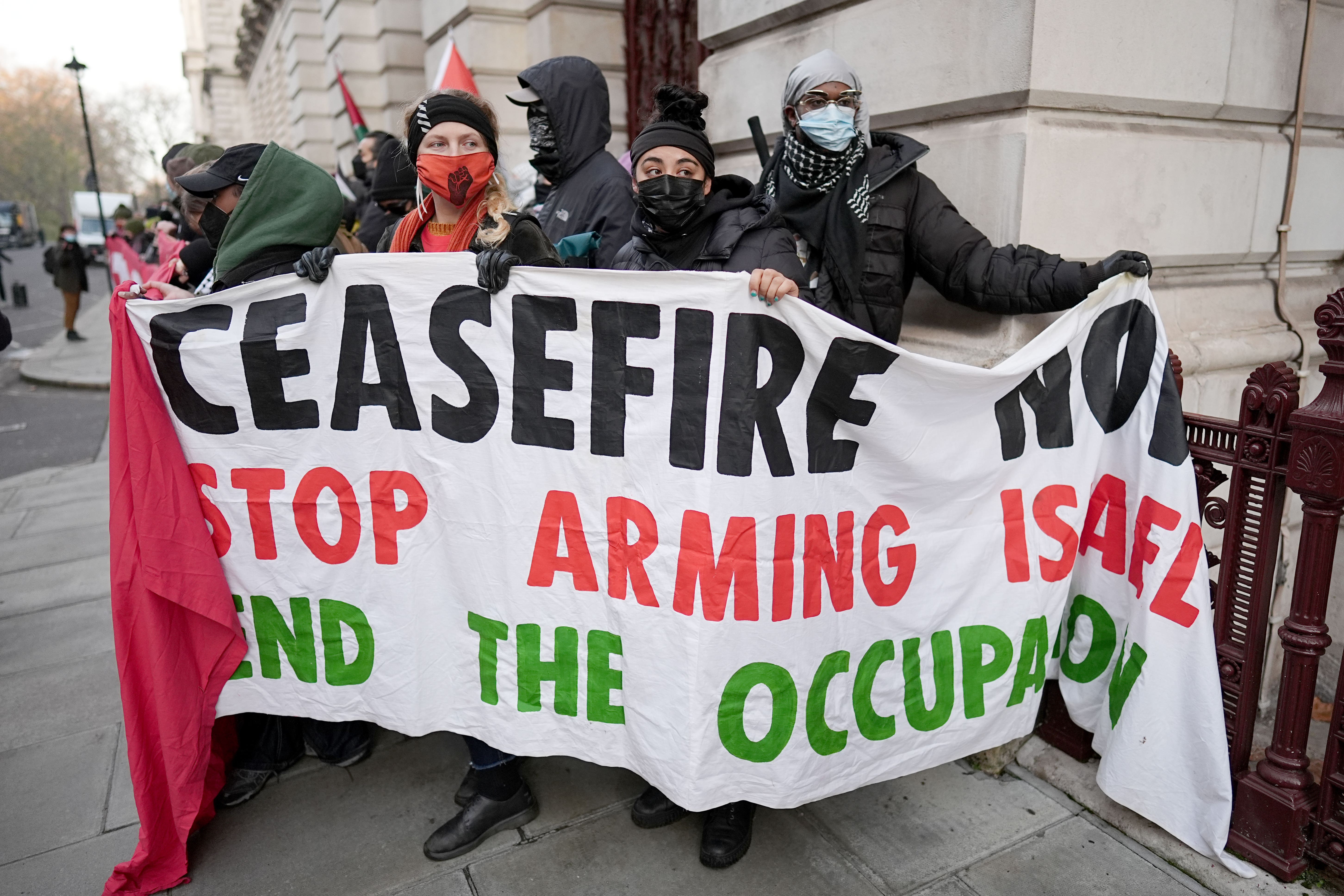 Pro-Palestine activists and trade unionists protest in central London.