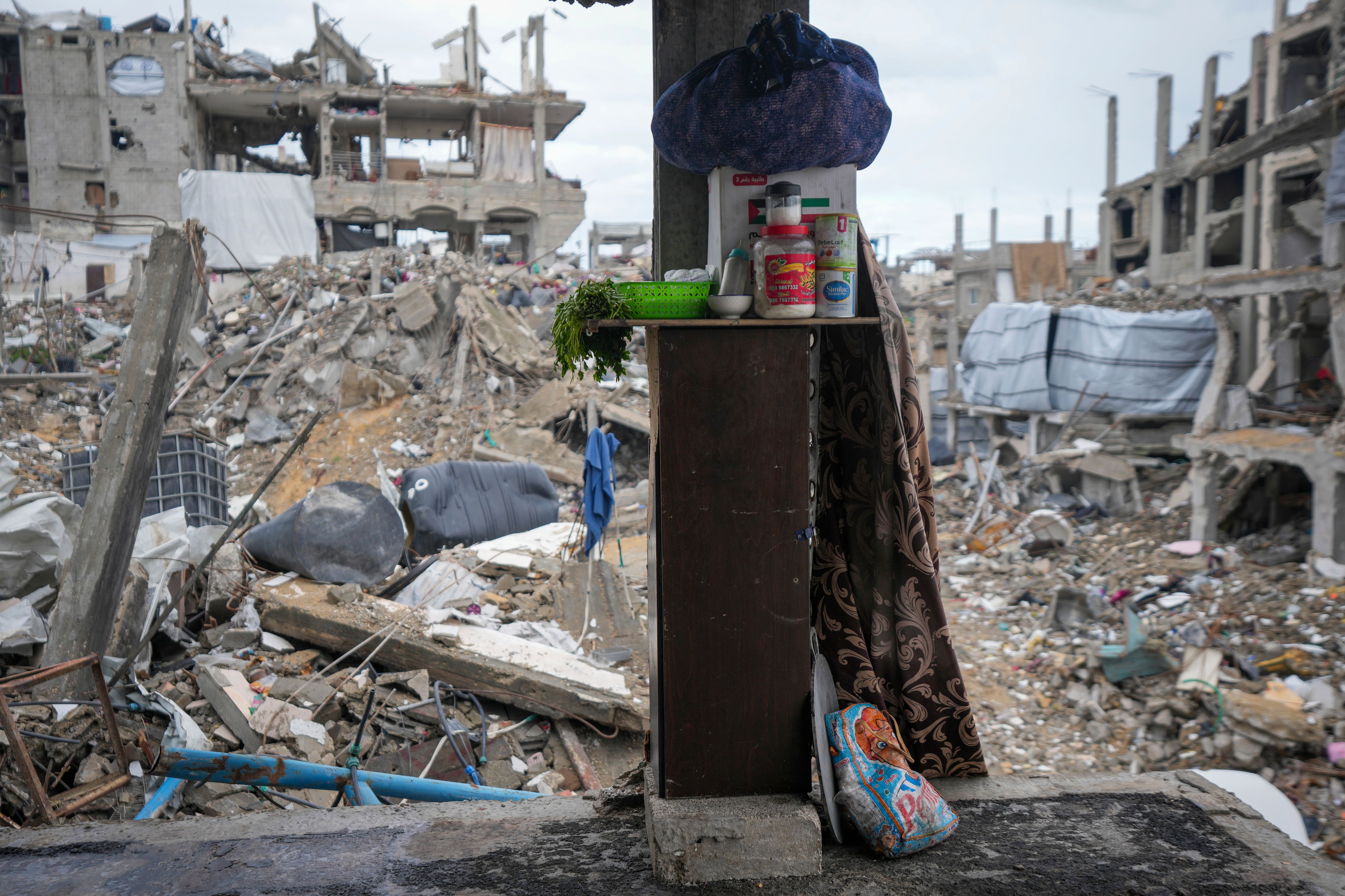 Destroyed walls expose the devastation outside the Odeh house in the Jabaliya refugee camp in the northern Gaza Strip (Abdel Kareem Hana/AP)