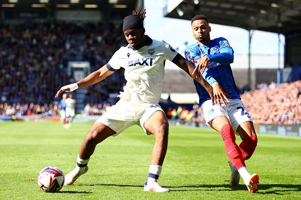 Peter Kioso of Oxford United battles with Josh Murphy of Portsmouth back in October