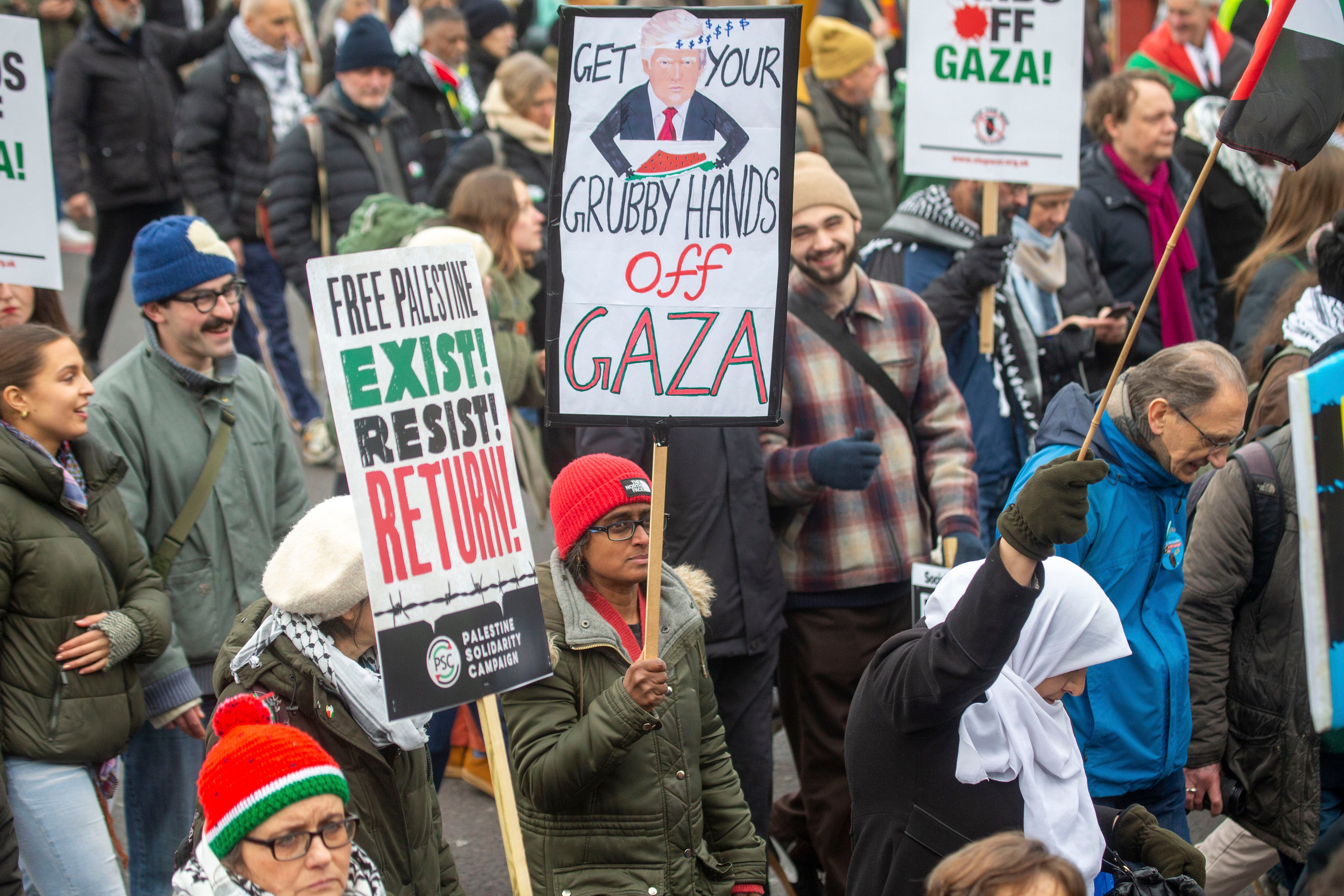 Activists march from Whitehall to the US Embassy during a national demonstration against US President Donald Trump's Gaza reconstruction plan