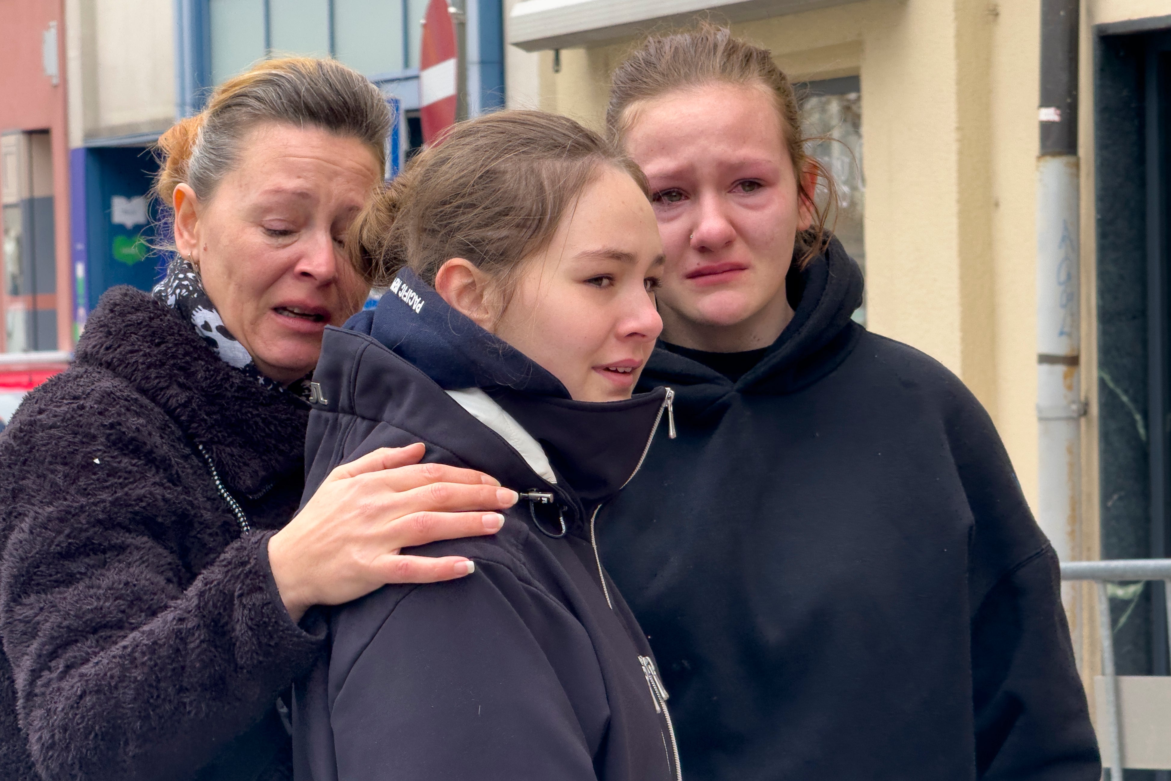 Devastated mourners paid their respects at the site of the attack