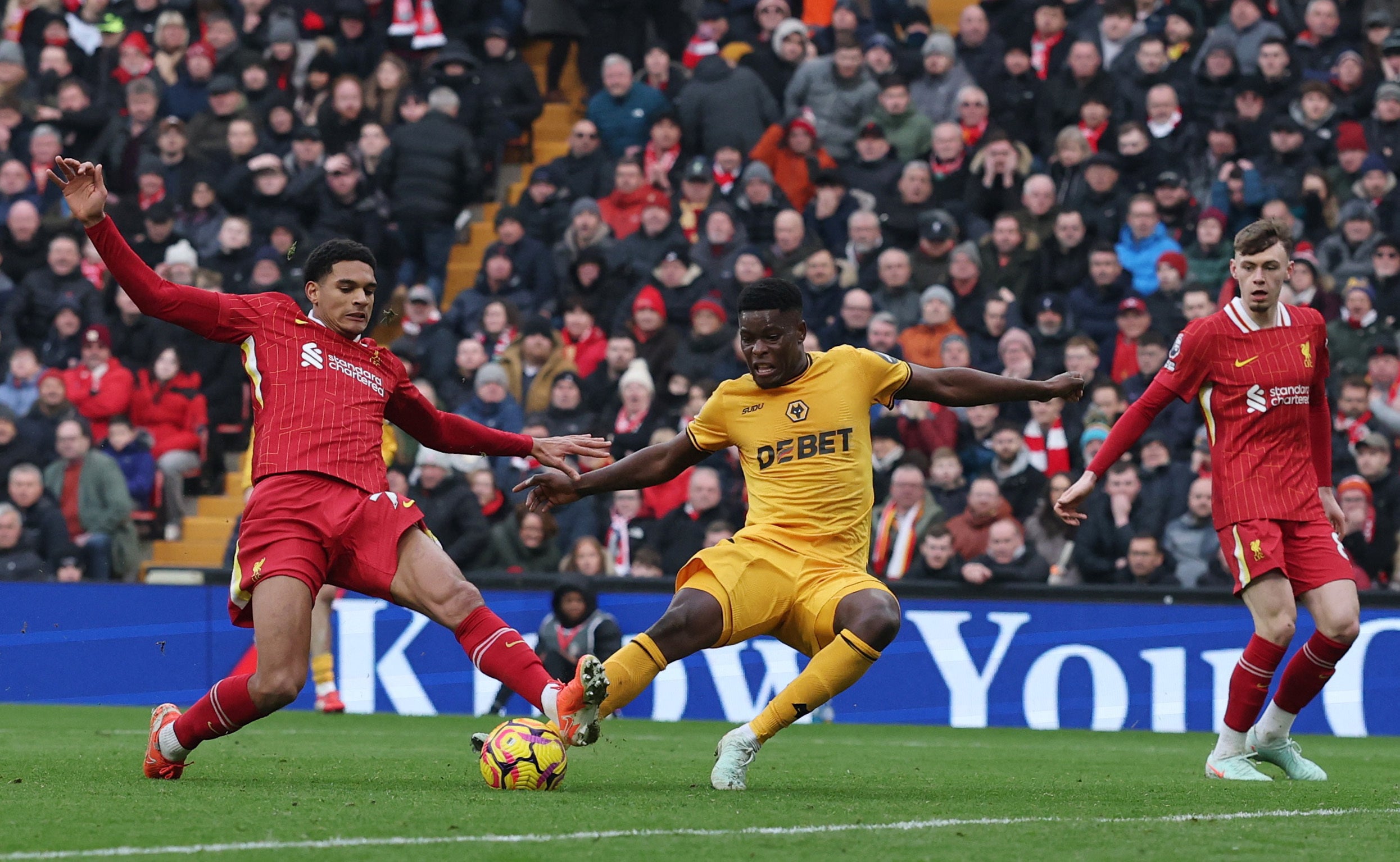 Quansah makes an important challenge to help see out victory for Liverpool