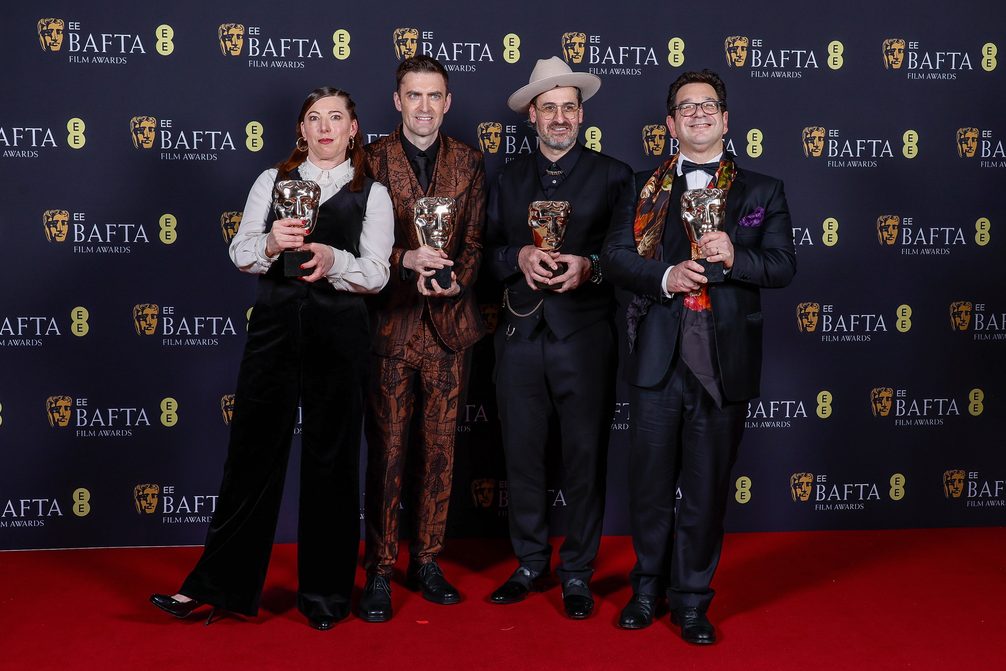 Peter Ettedgui, far right, a Bafta-winning film director, has accused Farage of making racist remarks when they were at school together