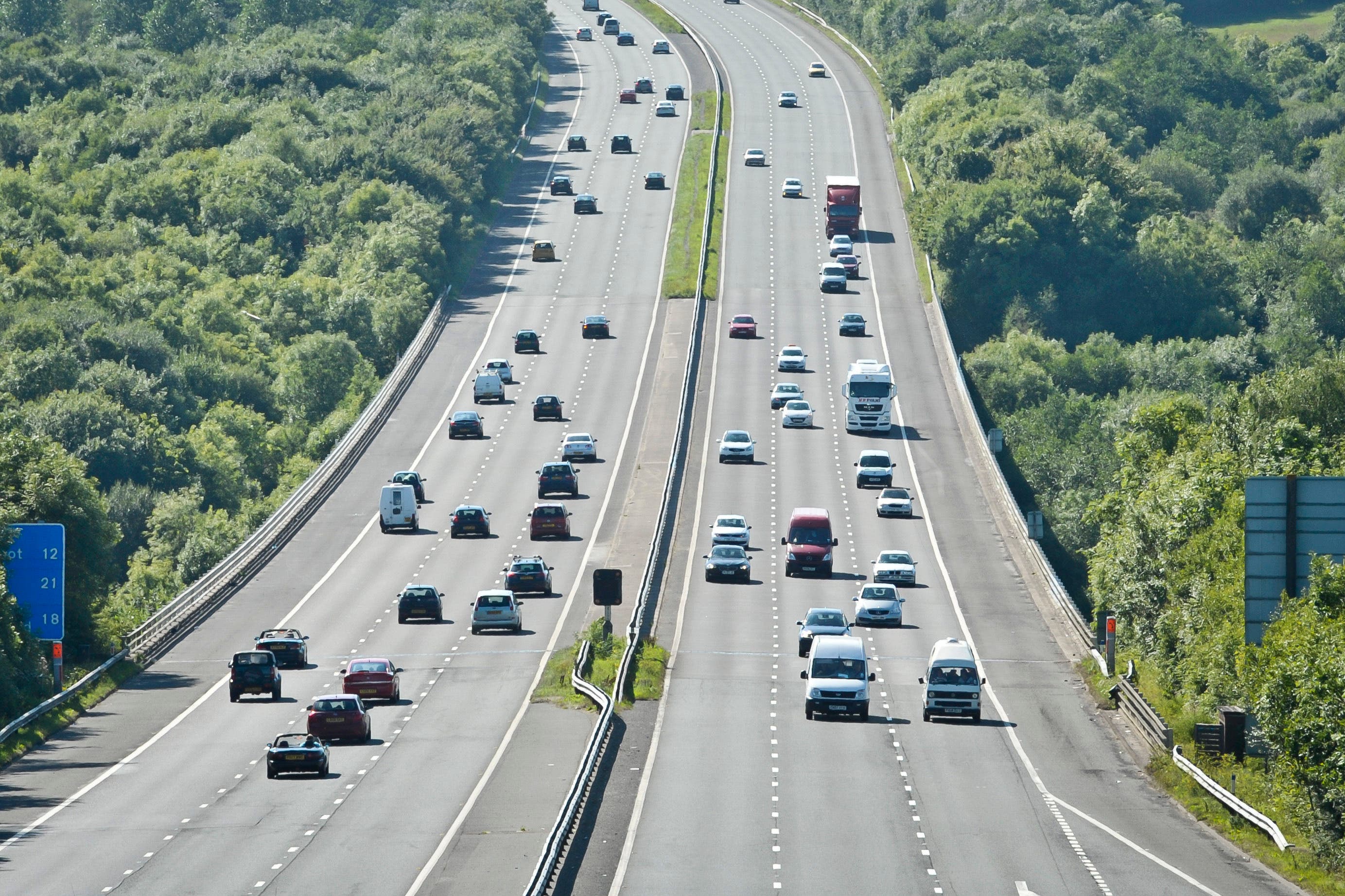 You should only stop on a motorway when told to by a police or traffic officer, or by a road sign