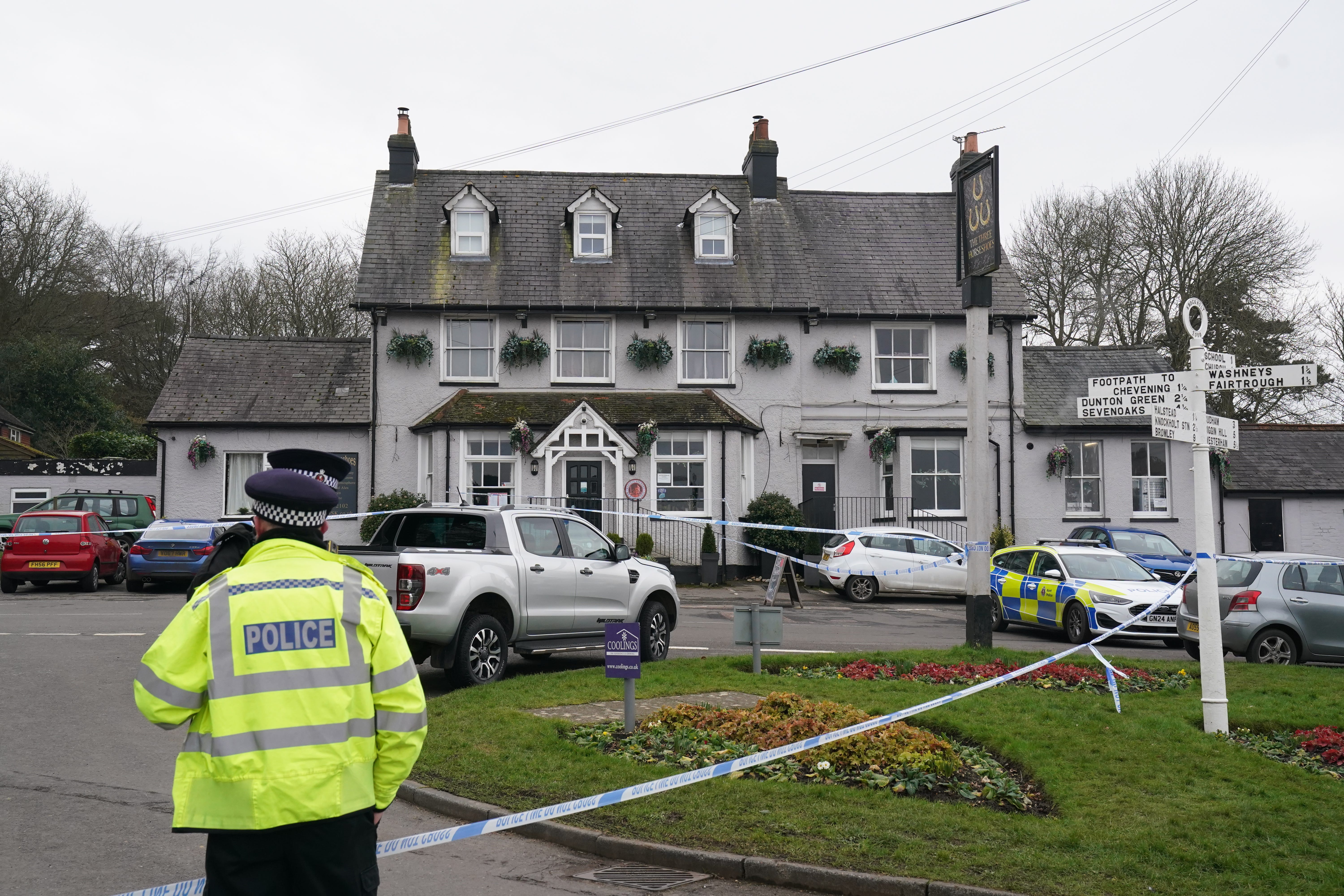 A police cordon outside the Three Horseshoes pub in Knockholt, Sevenoaks in Kent (Gareth Fuller/PA)