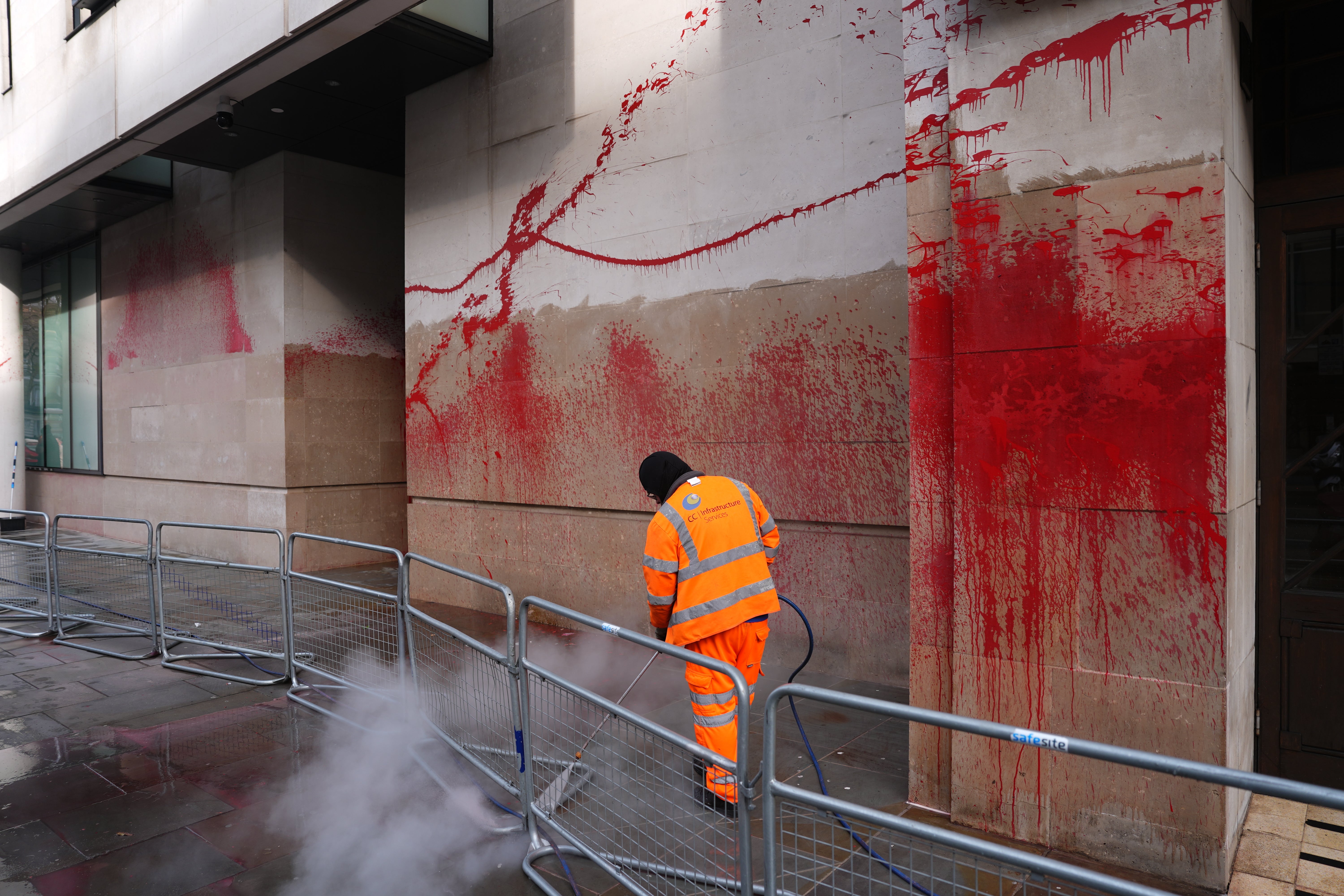 <p>Red paint sprayed on the walls of the BBC by Palestine Action</p>
