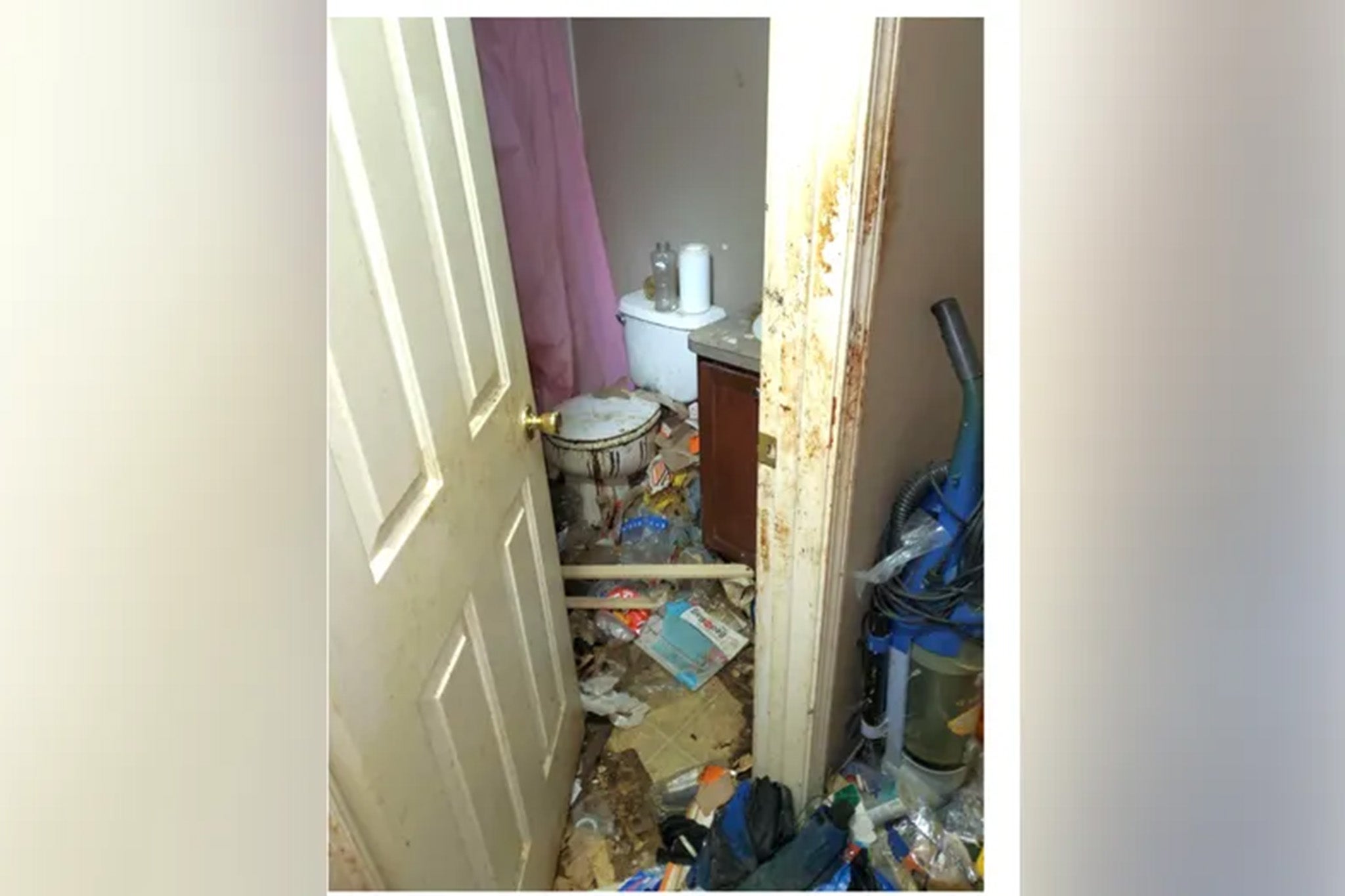 Deputies said garbage was piled as high as four feet in some rooms, the toilet overflowing and there were feces in the bathtub