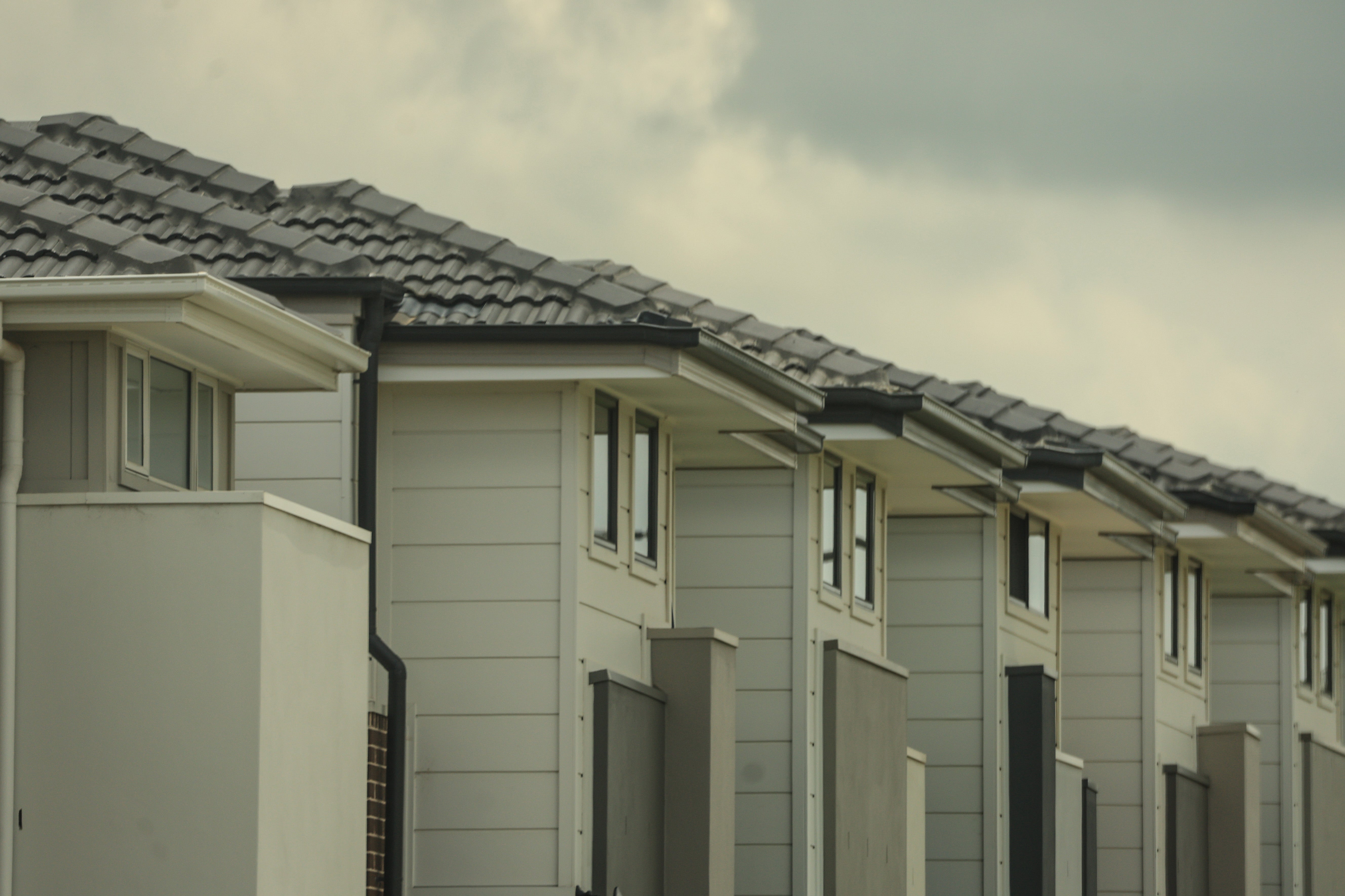 File. Newly built houses are seen in the Western Suburbs on 11 January 2024 in Sydney, Australia