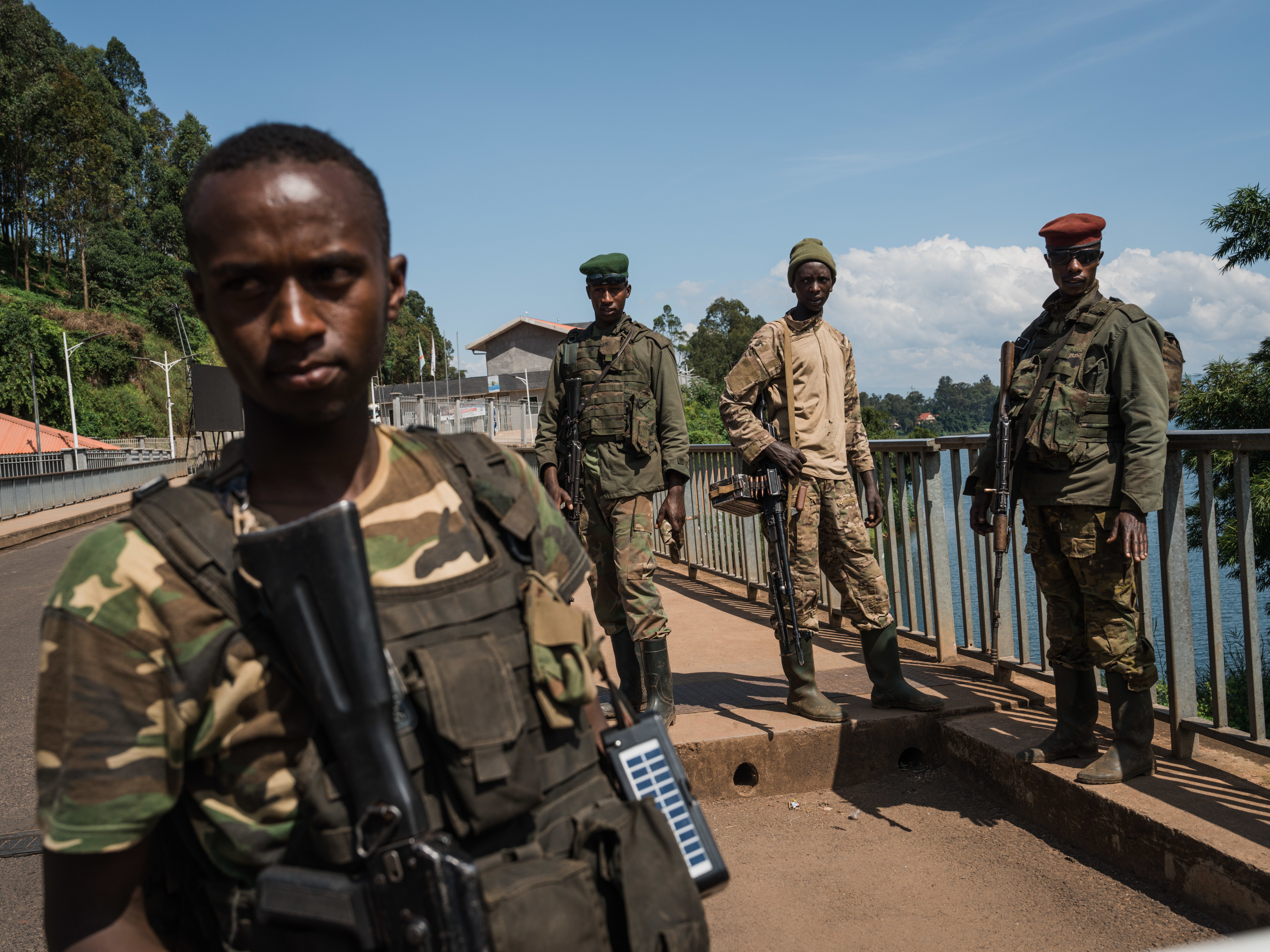 M23 rebel troops arrive at the Rusizi border post, joining the Congolese city of Bukavu with Cyangugu in Rwanda, on February 16