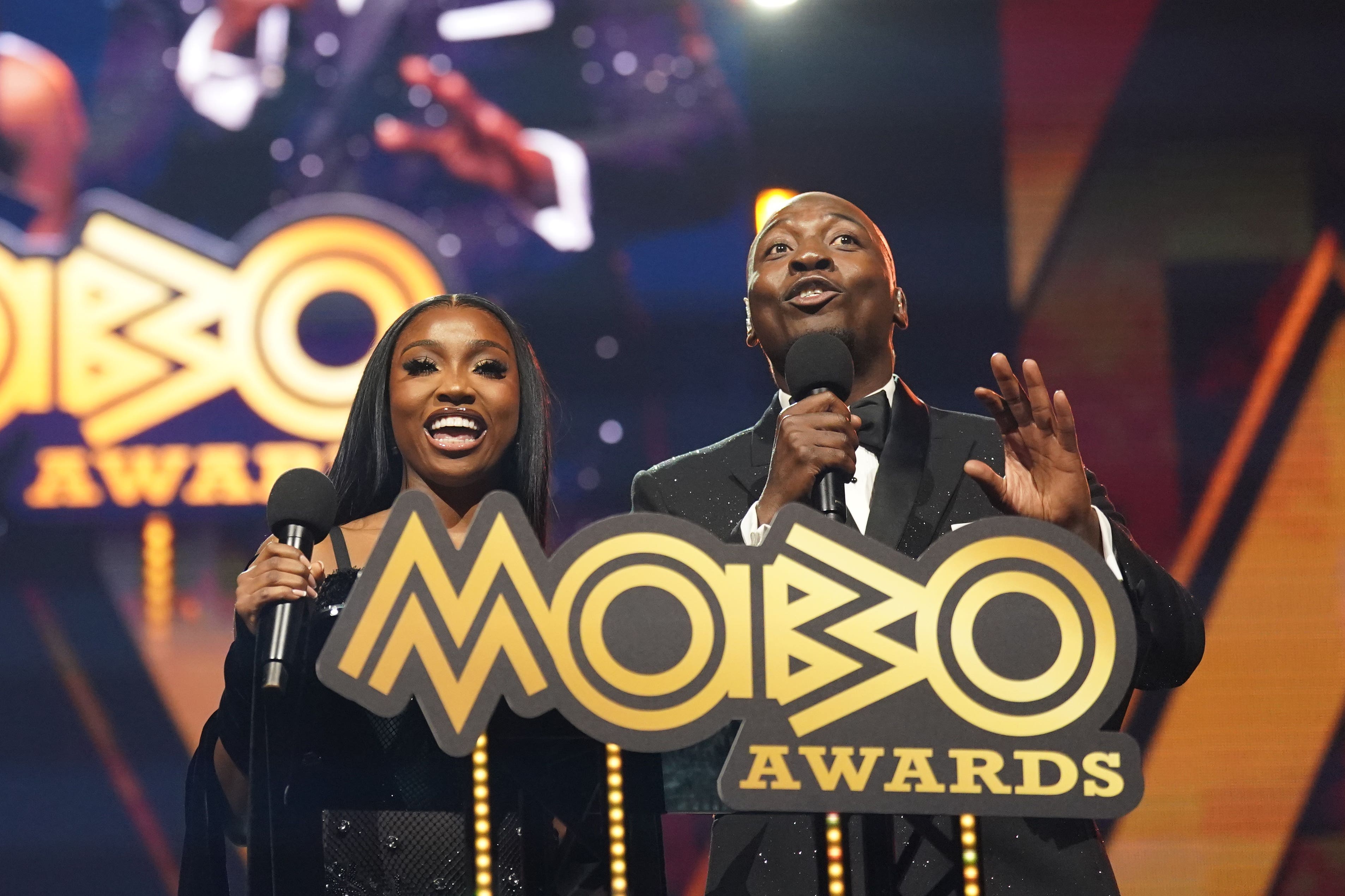 Indiyah Polack and Eddie Kadi hosting the Mobo Awards (Owen Humphreys/PA)