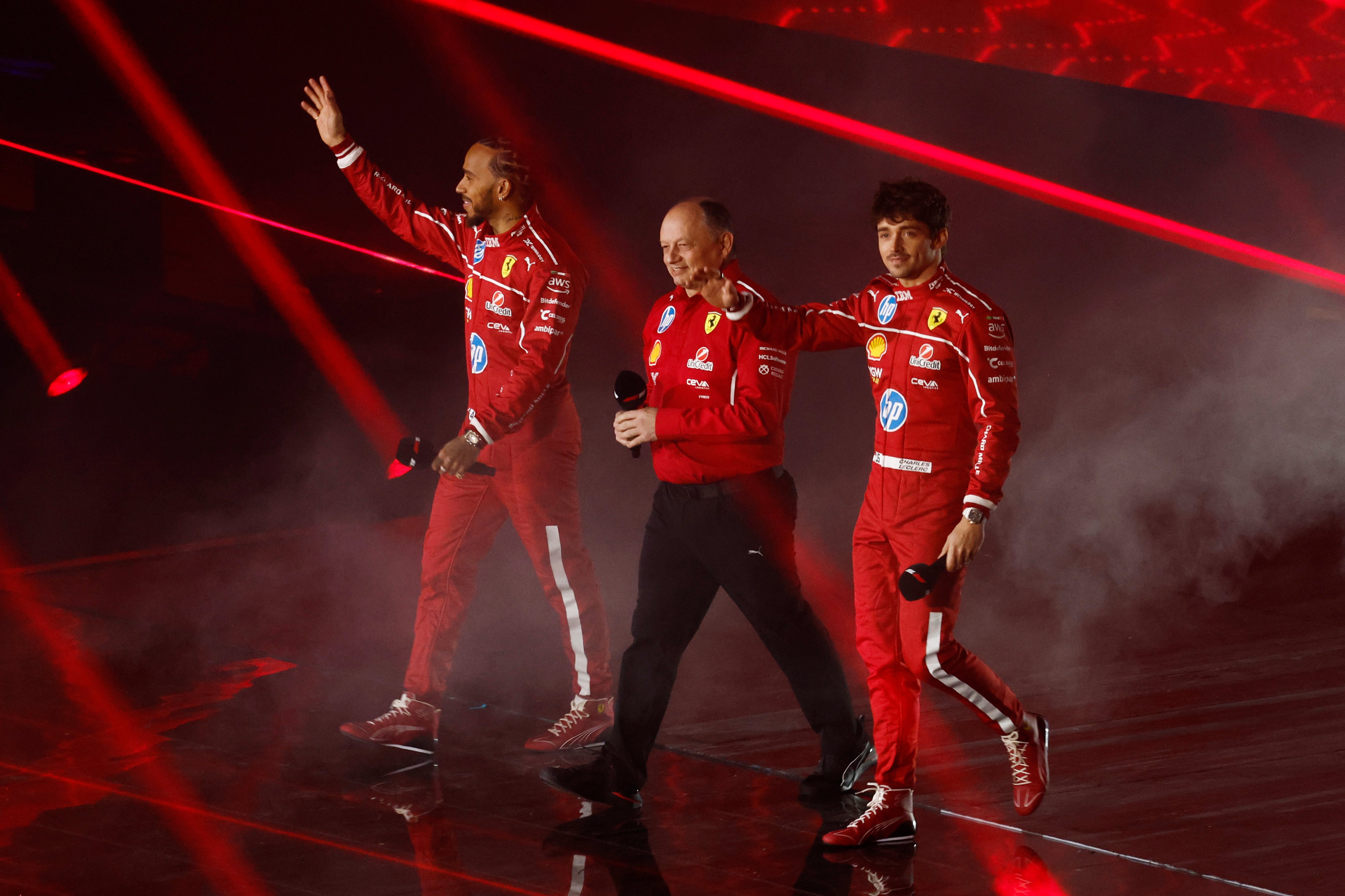 Hamilton appears with Ferrari boss Fred Vasseur and teammate Charles Leclerc