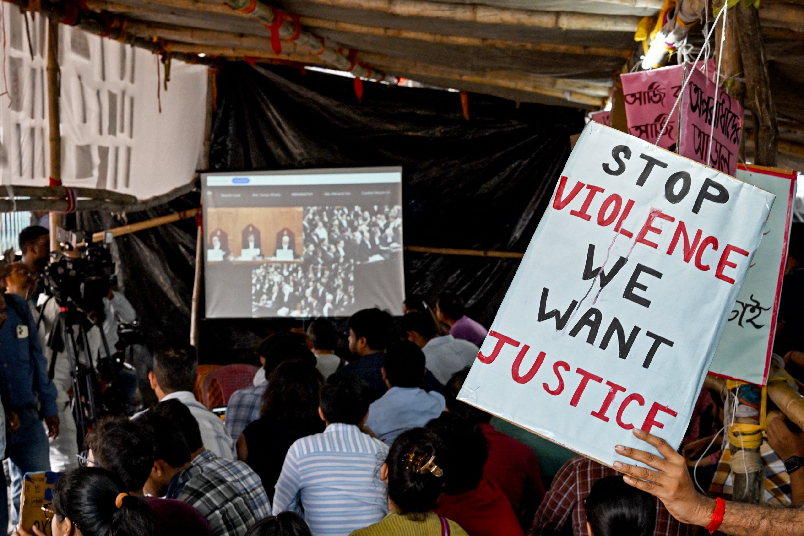 Representative: Students hold posters protesting violence against women in India