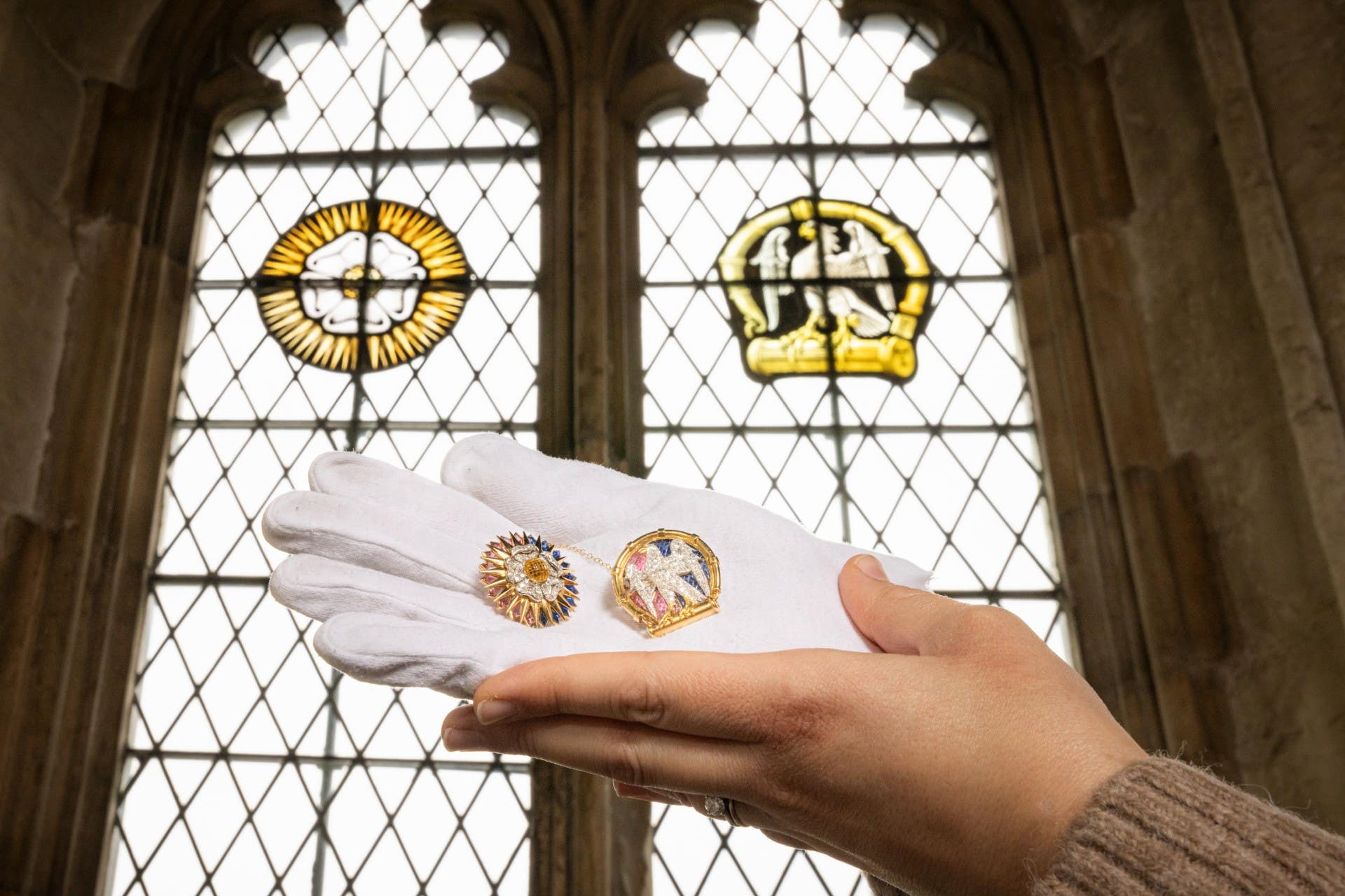 The brooches and the window at Eltham Palace (English Heritage/PA)