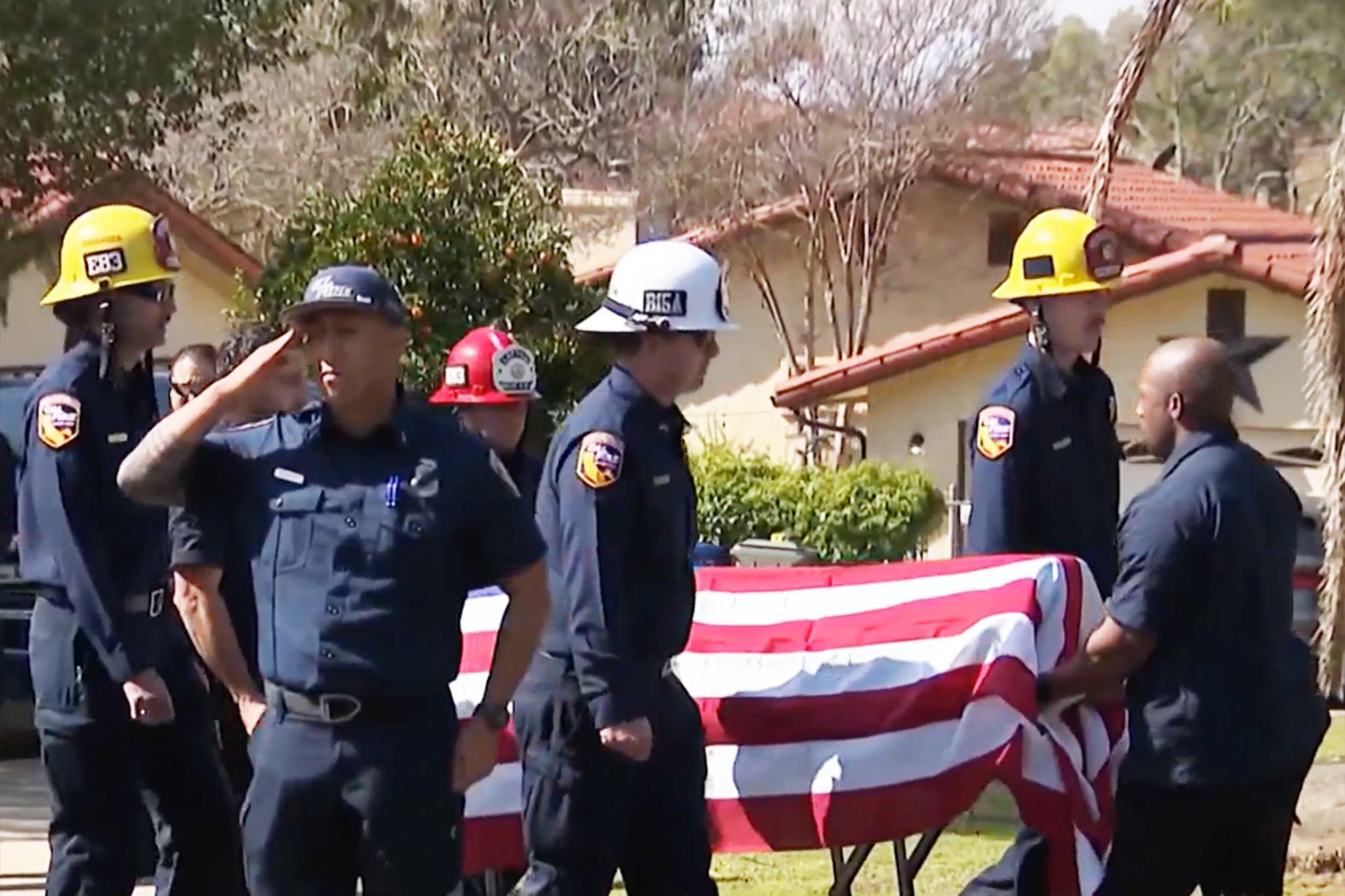 Marodi was draped in the American flag and wheeled out of her home on a gurney on Tuesday