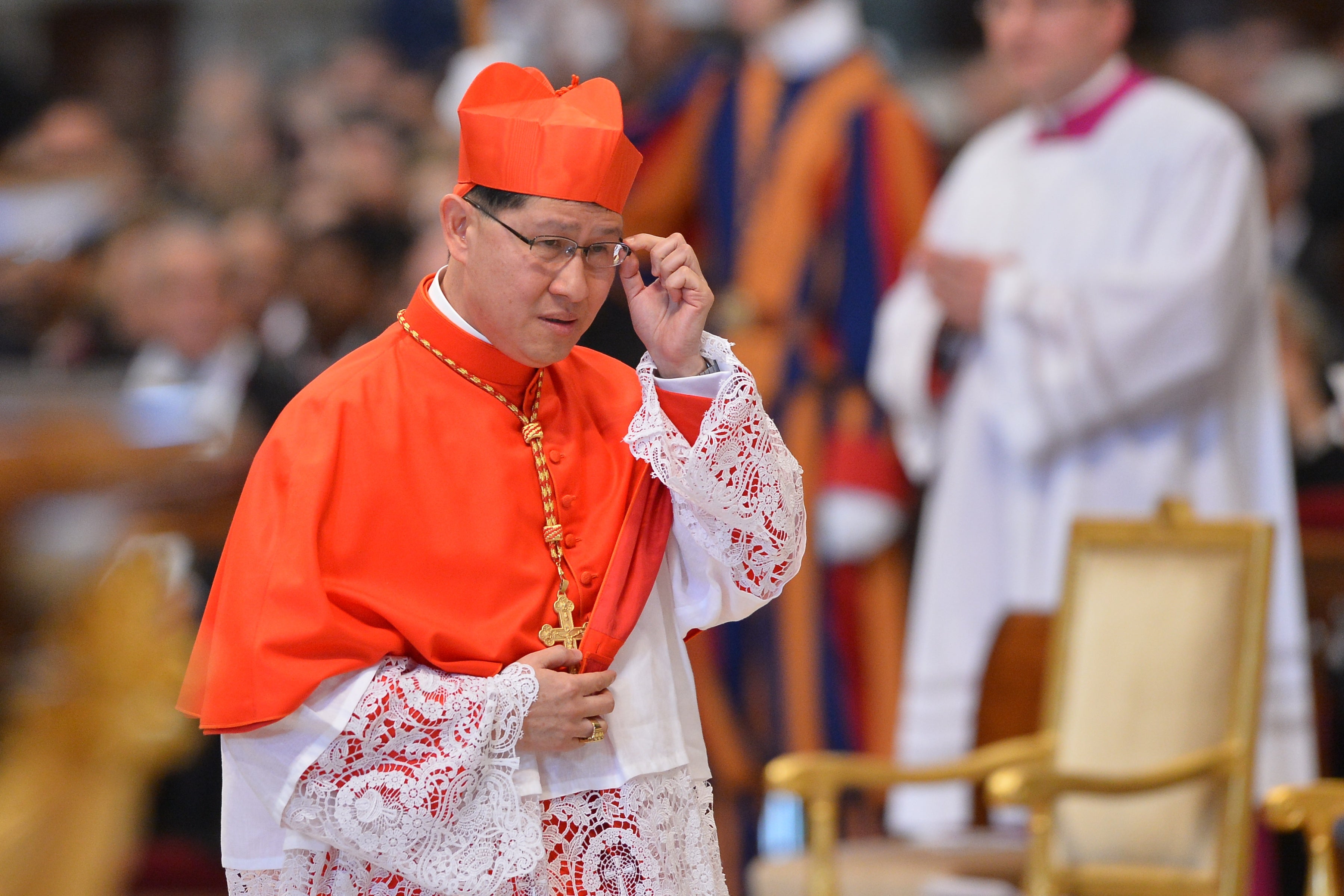 Tagle wearing his biretta hat, after Pope Benedict XVI appointed him as a cardinal during a ceremony on 24 November 2012, at St Peter’s Basilica at the Vatican