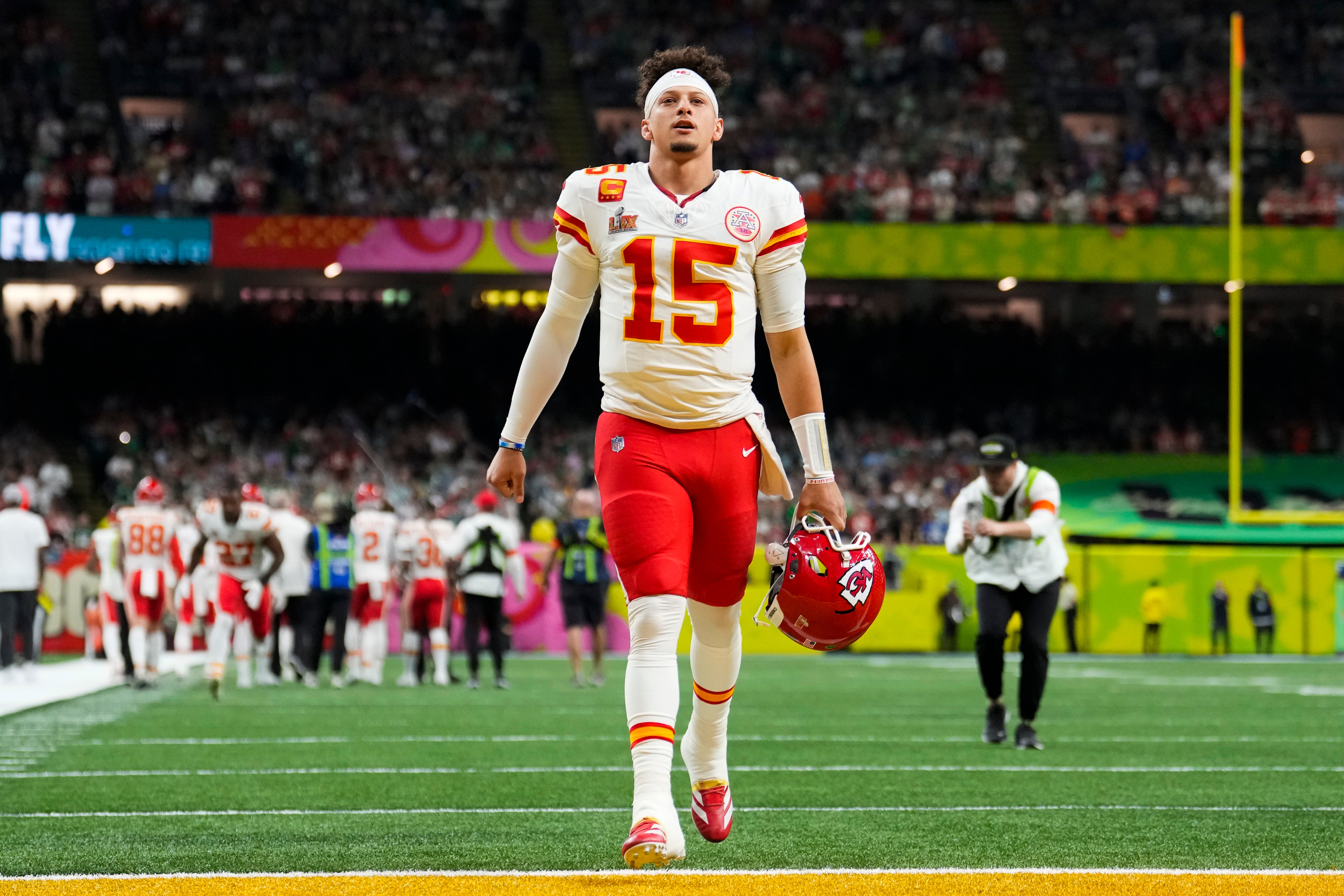 Babudar was earlier ordered to forfeit anything he used to launder the money, including an autographed painting of Chiefs quarterback Patrick Mahomes, pictured
