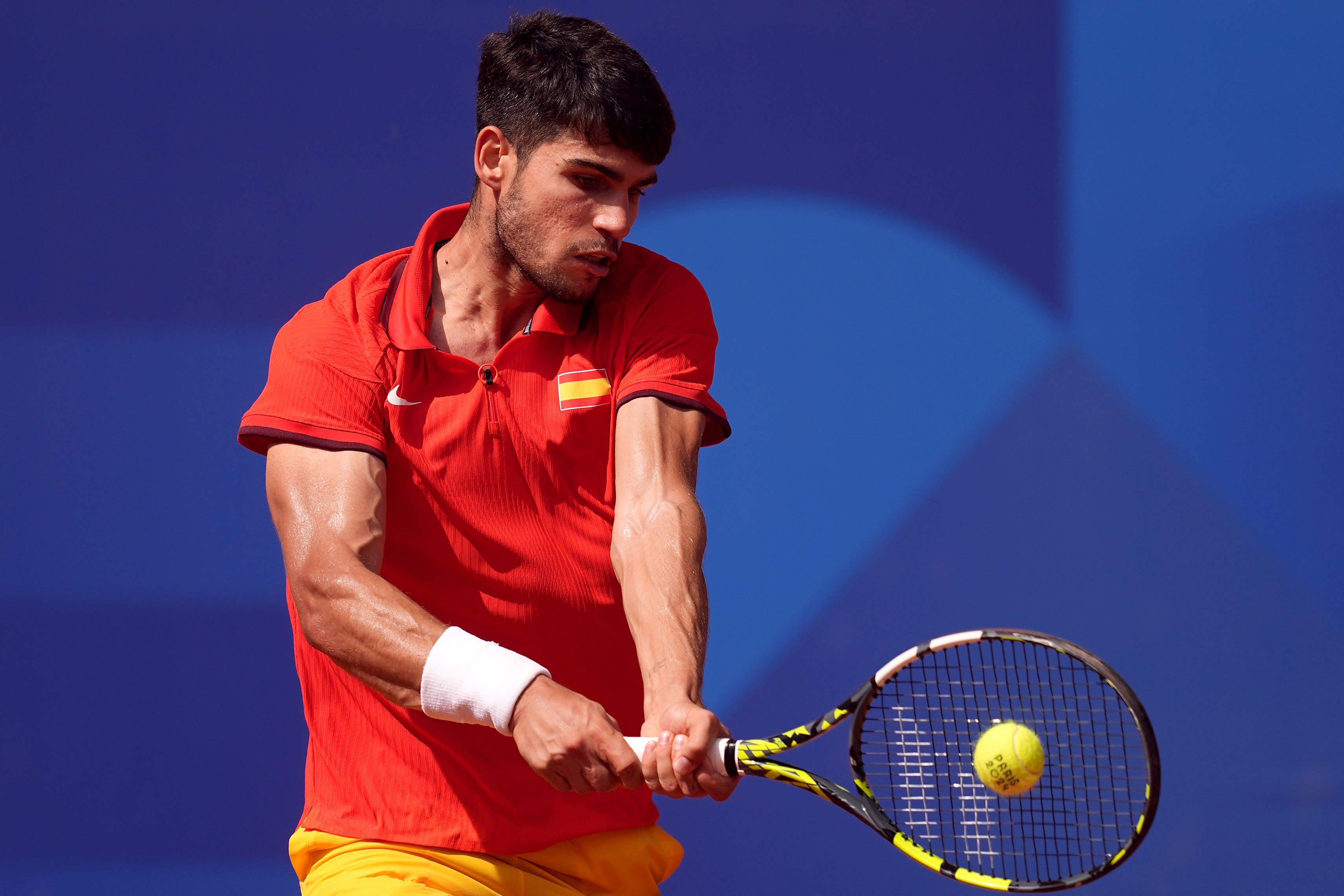 Carlos Alcaraz is through to the quarter-final of the Qatar Open with a win over Luca Nardi (Martin Rickett/PA)