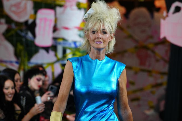 Jane Moore wore a skin-tight electric blue gown at London Fashion Week (Jeff Moore/PA)