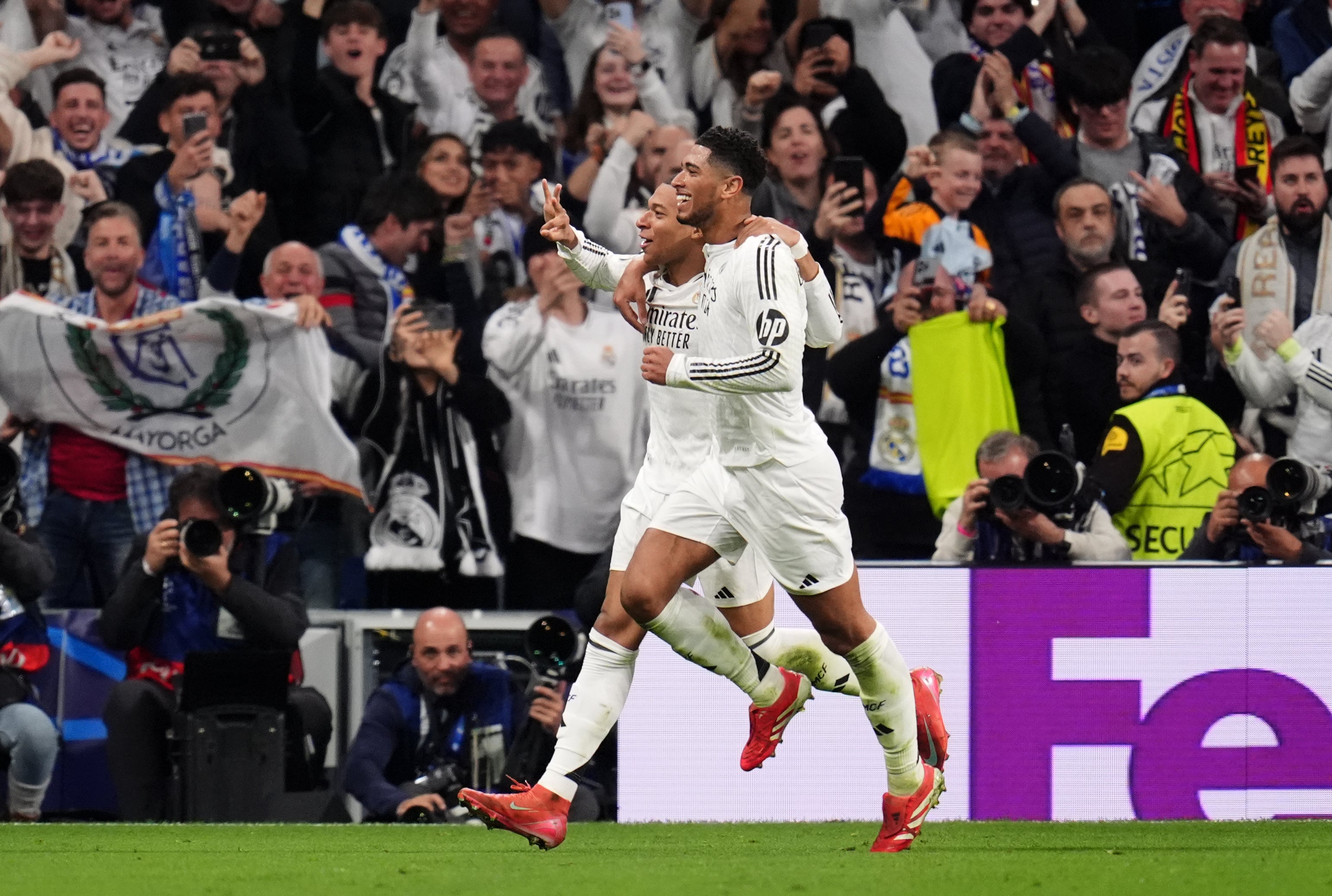 Kylian Mbappe, left, celebrates with Jude Bellingham