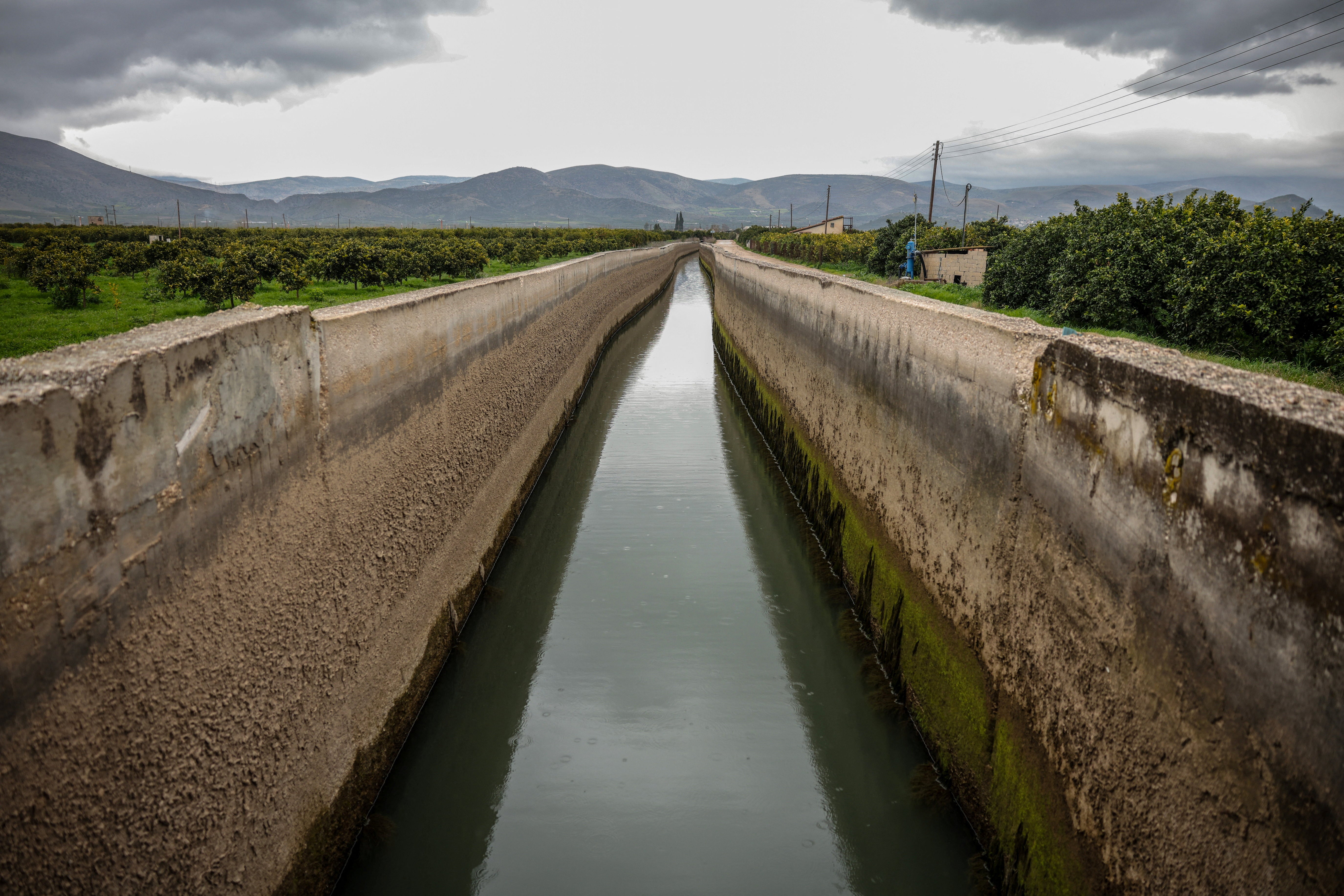 A view of one of the irrigation canals feeding orange trees in the Argolida region, near Nafplion, Greece, February 4, 2025