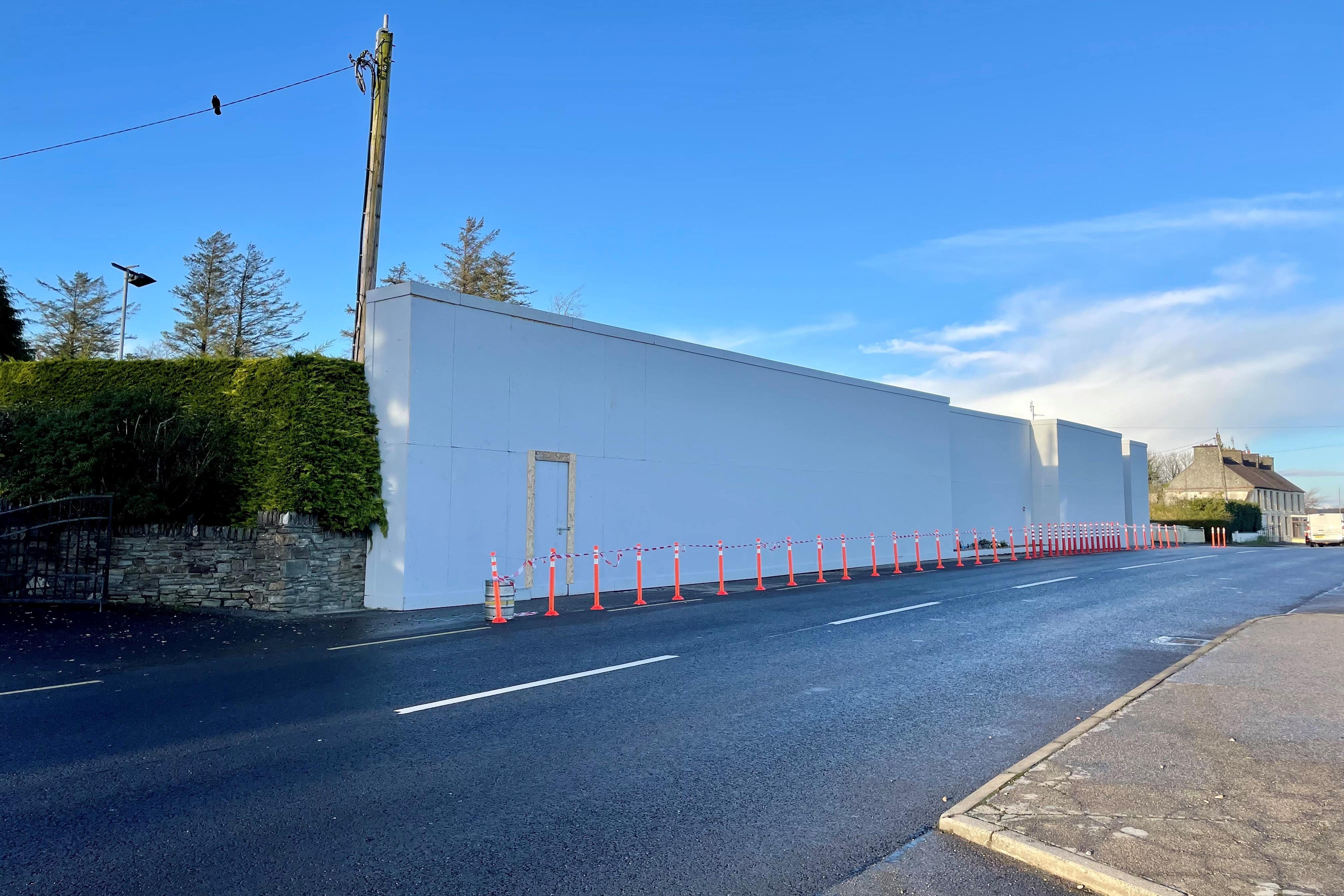A boarded up petrol station in Creeslough, Co Donegal (PA)