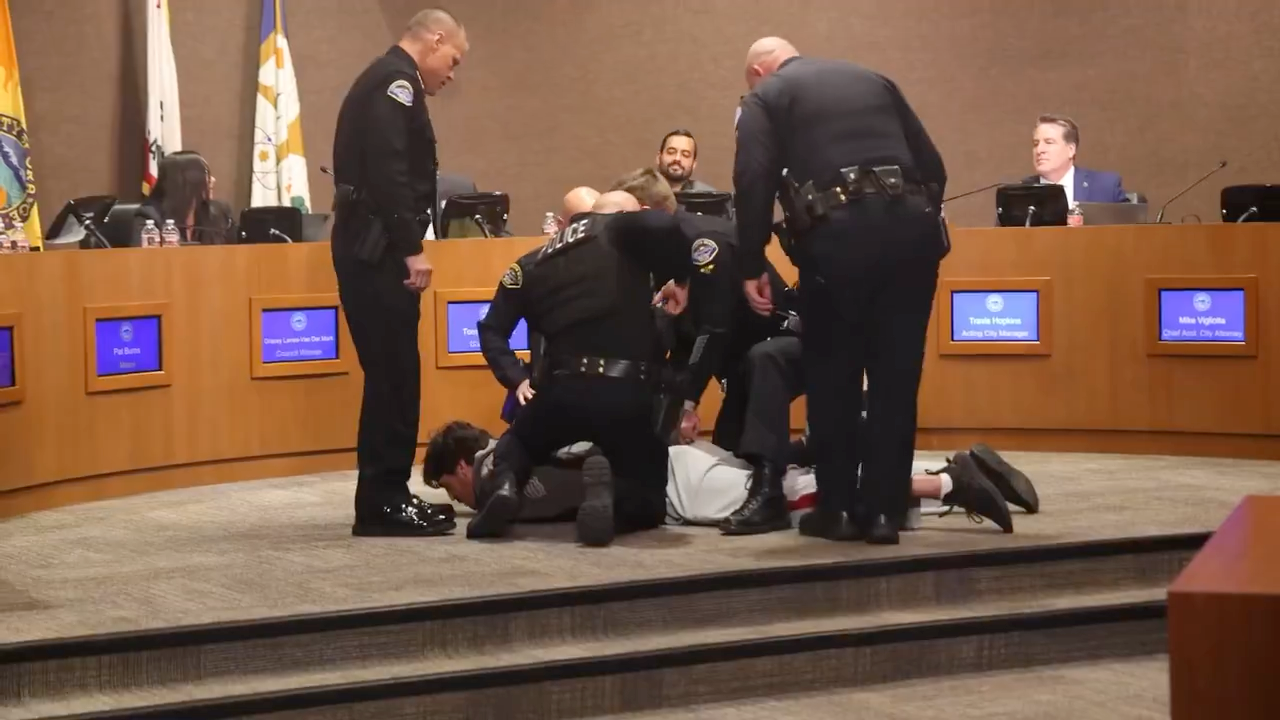 Chris Kluwe was arrested after moving toward the dais where Huntington Beach City Council members were seated