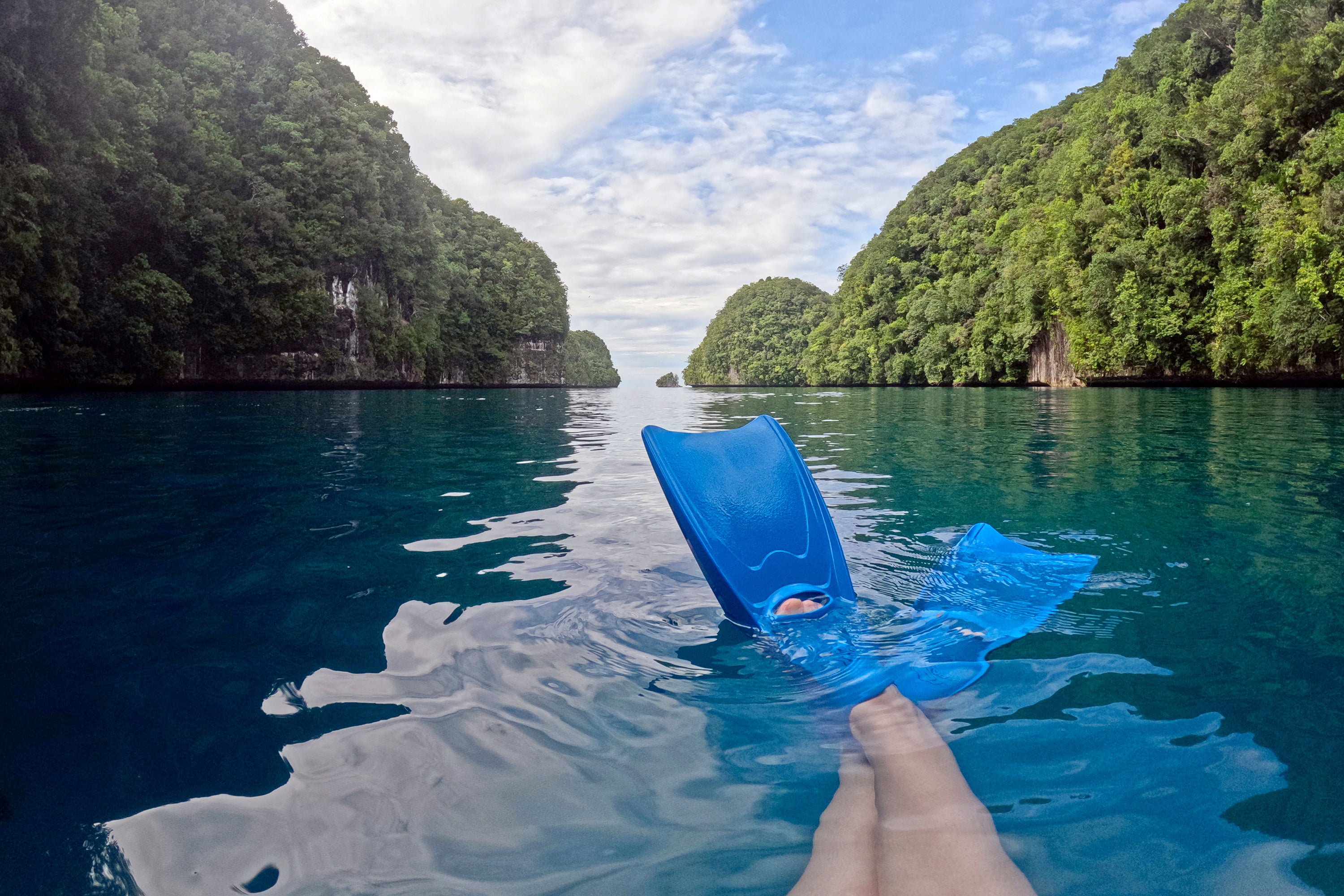 A snorkeler explores the Rock Islands Southern Lagoon near Koror, Palau