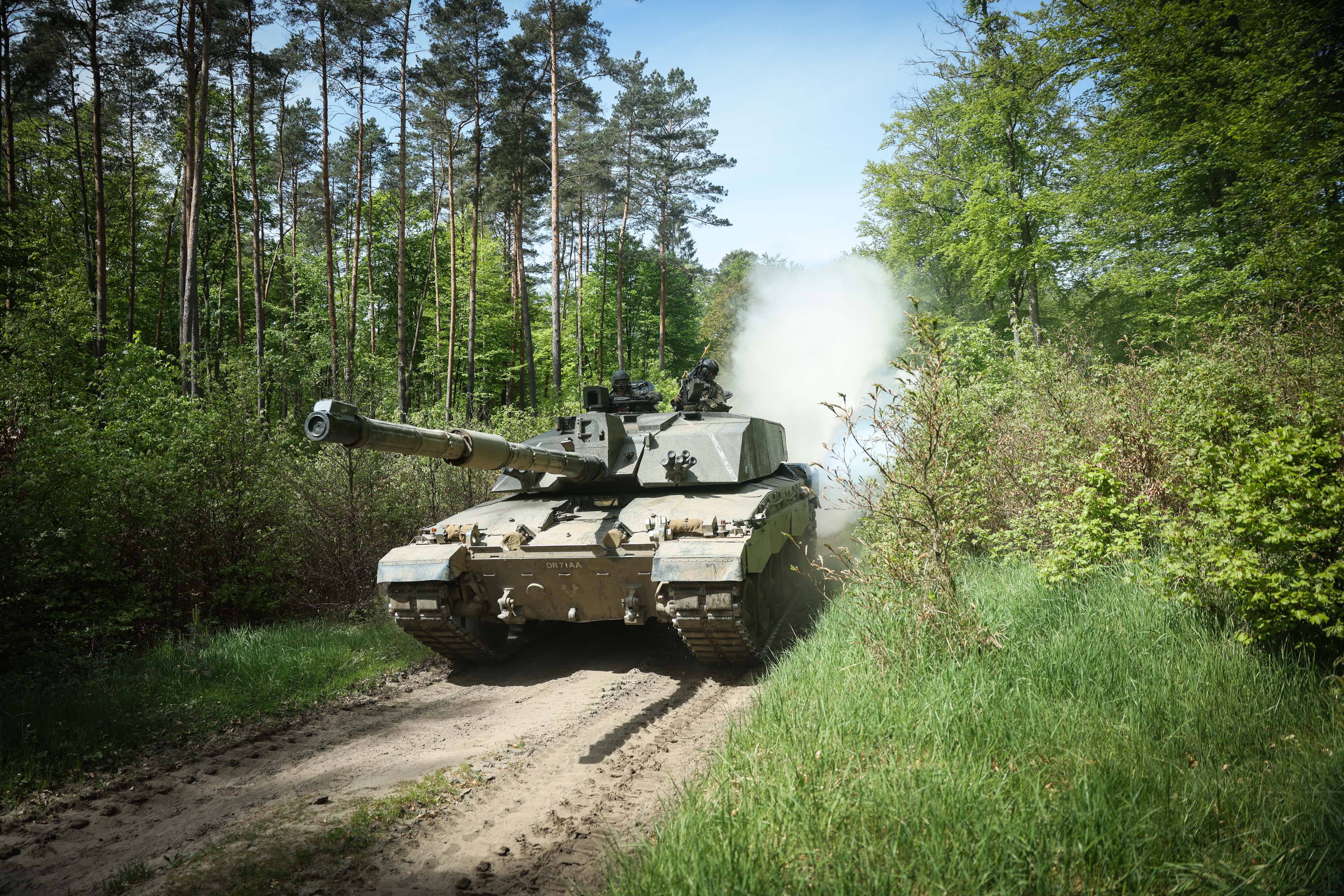 A Challenger 2 tank drives through the Drawsko Pomorskie training area in Poland
