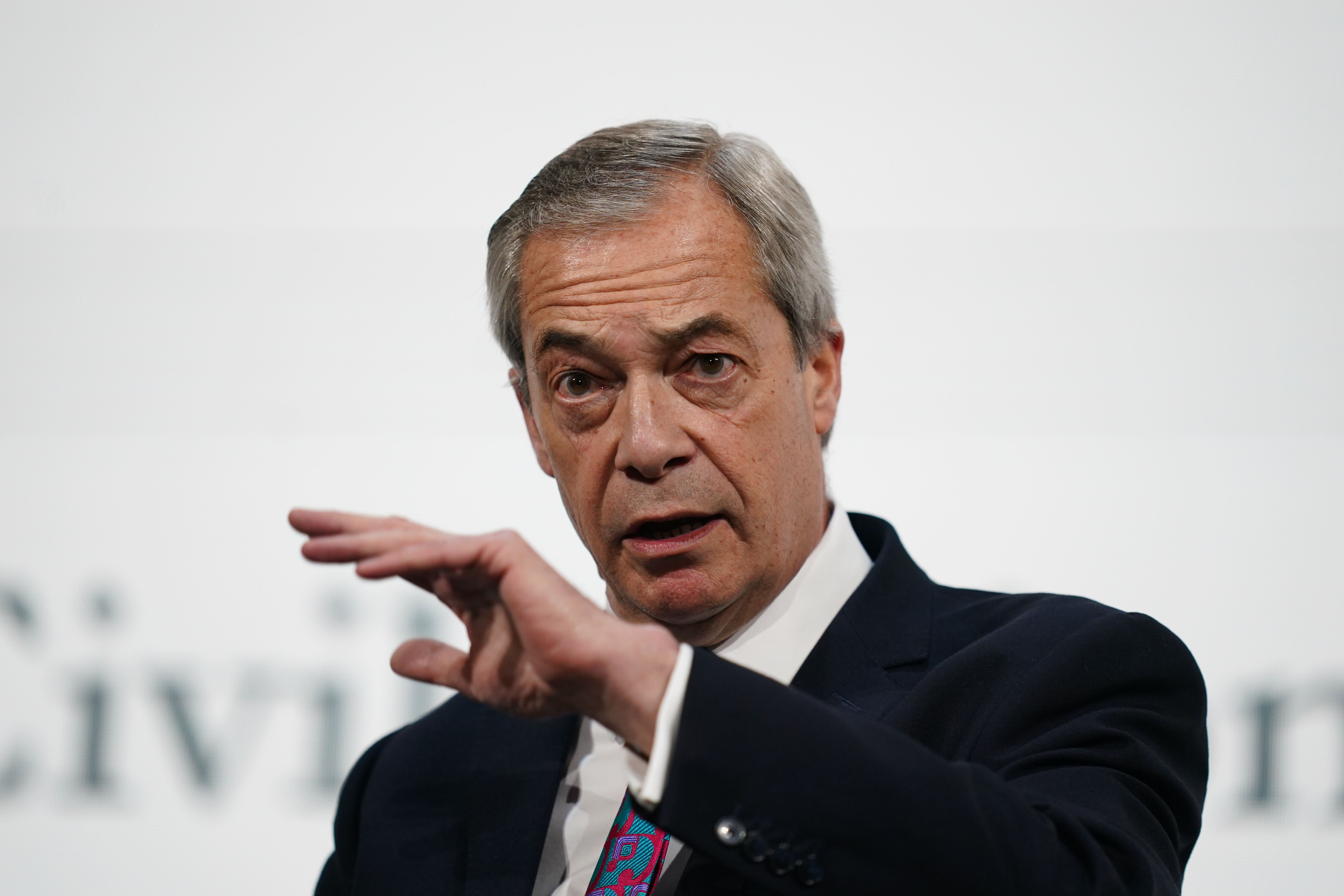 Nigel Farage has praised Elon Musk and Donald Trump at a conservative conference in Washington (Ben Whitley/PA)