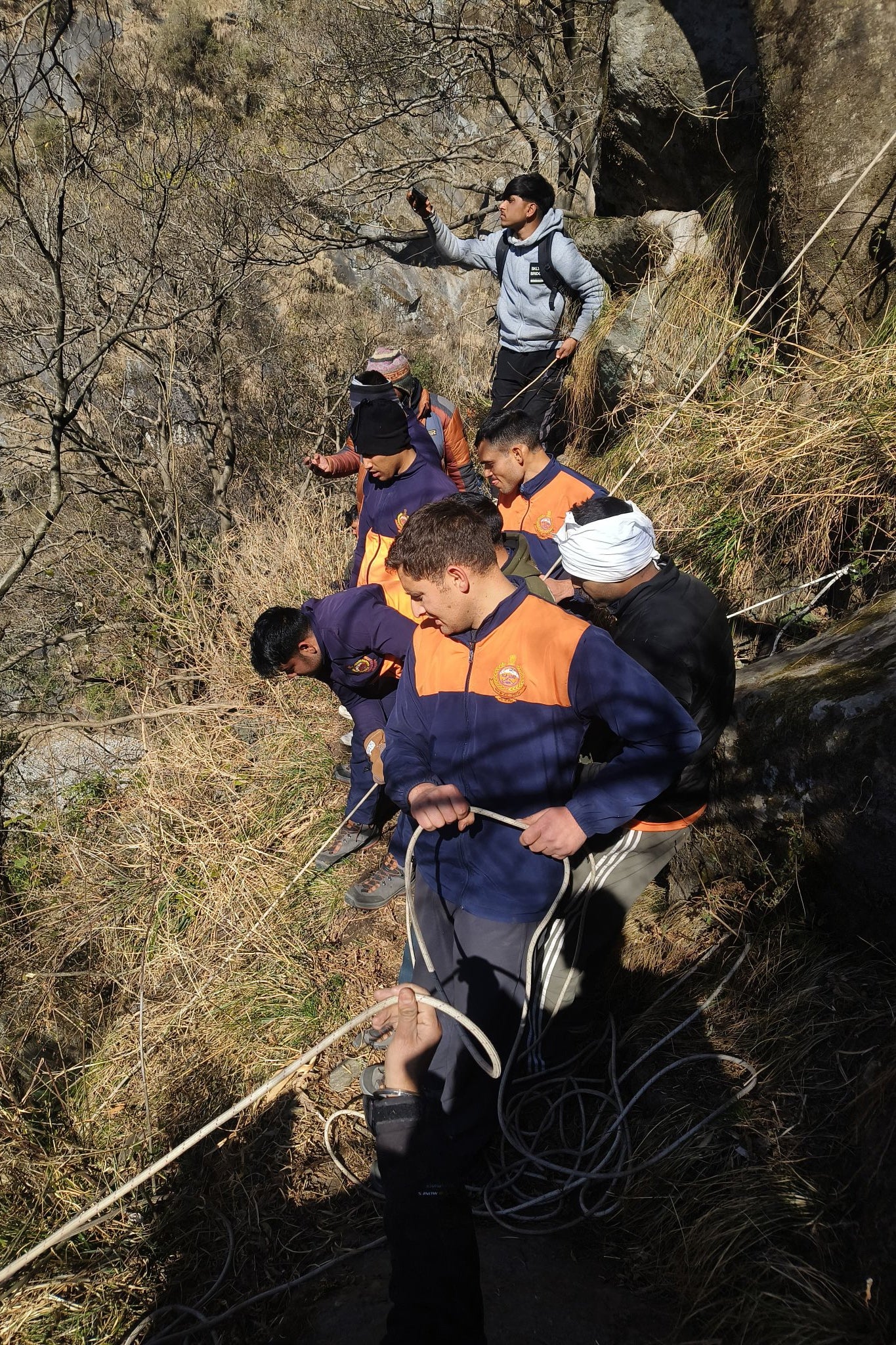 A rescue team carried the two hikers through the mountains