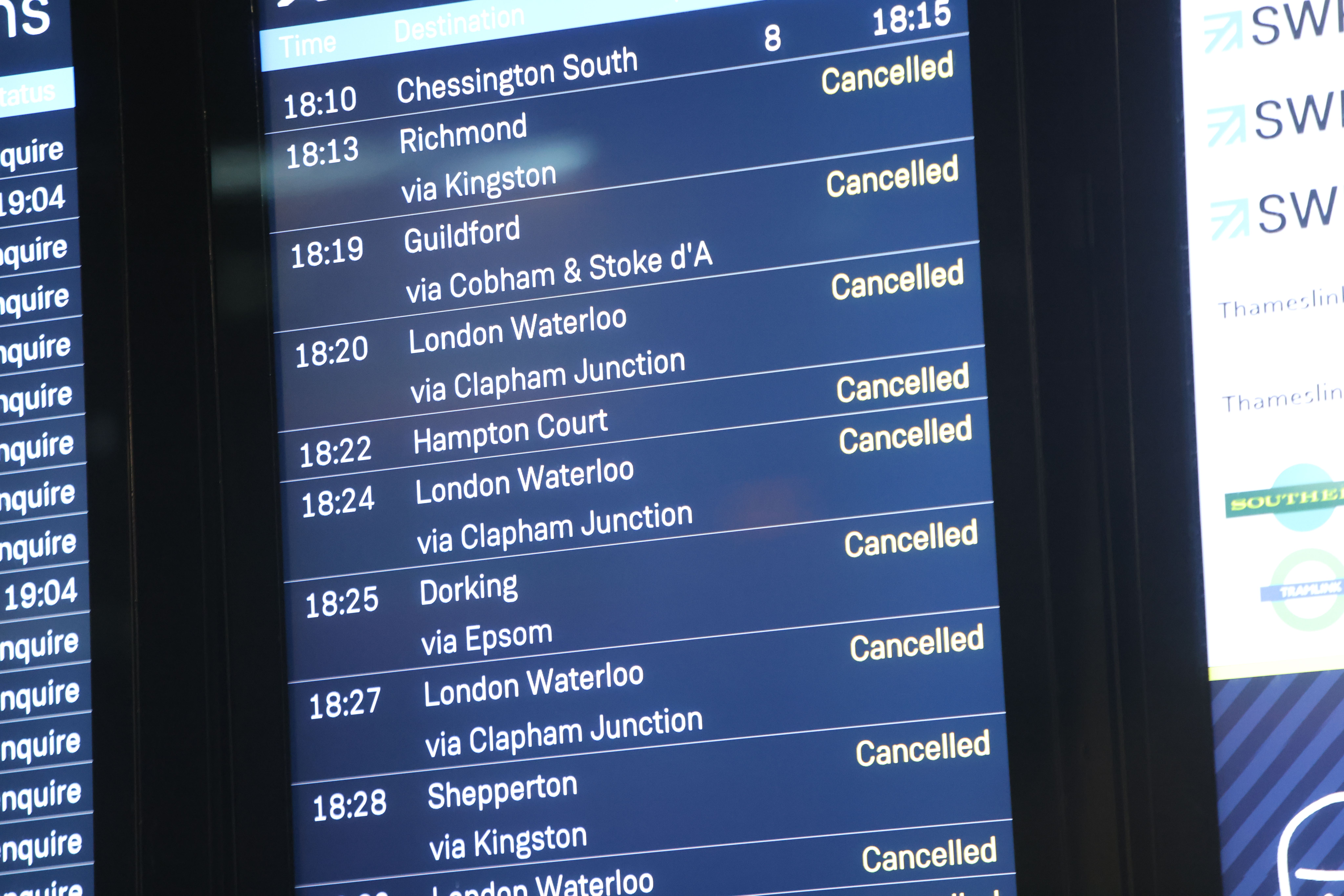 The train departures board at Wimbledon station