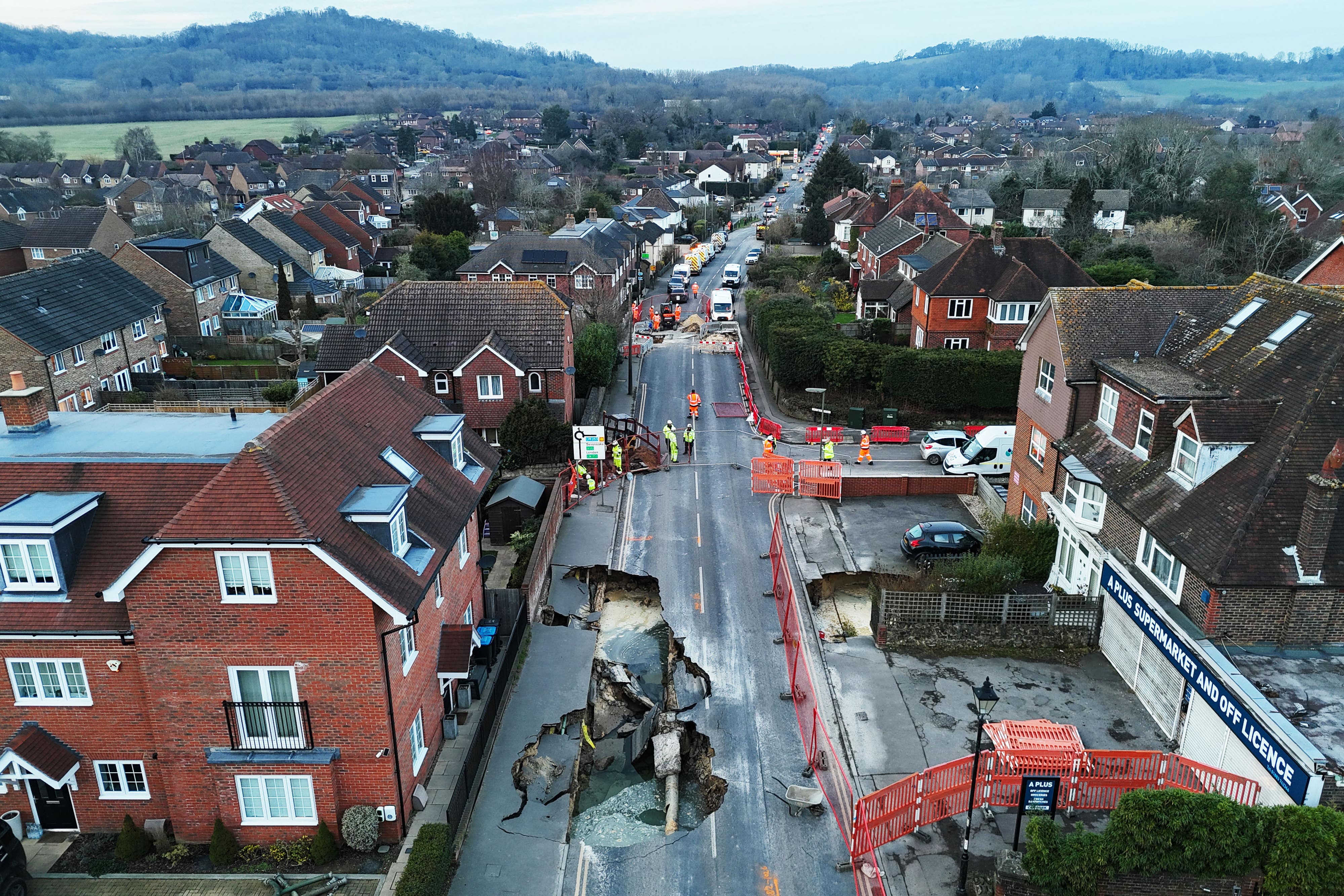 Thirty households were evacuated after a sinkhole appeared on Monday night in Godstone, Surrey