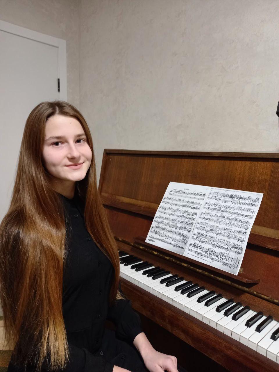 Liza watched as her house be destroyed by a Russian warplane