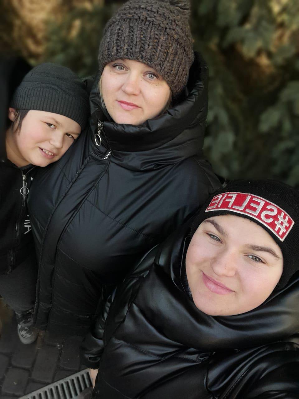 Oleksandr, left, with his mother Iryna