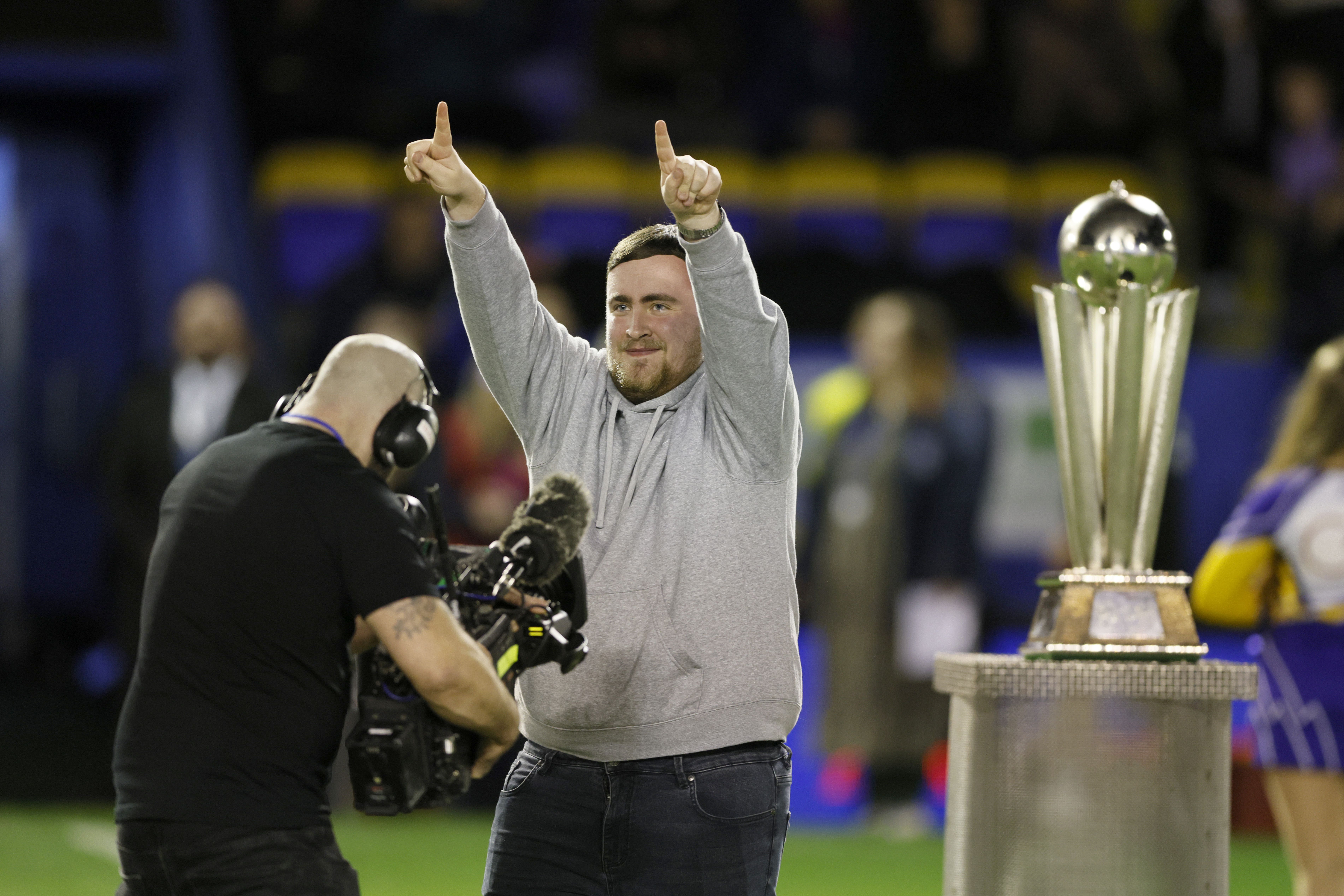 Luke Littler acknowledges the fans at the Luke Littler Stadium (Richard Sellers/PA)