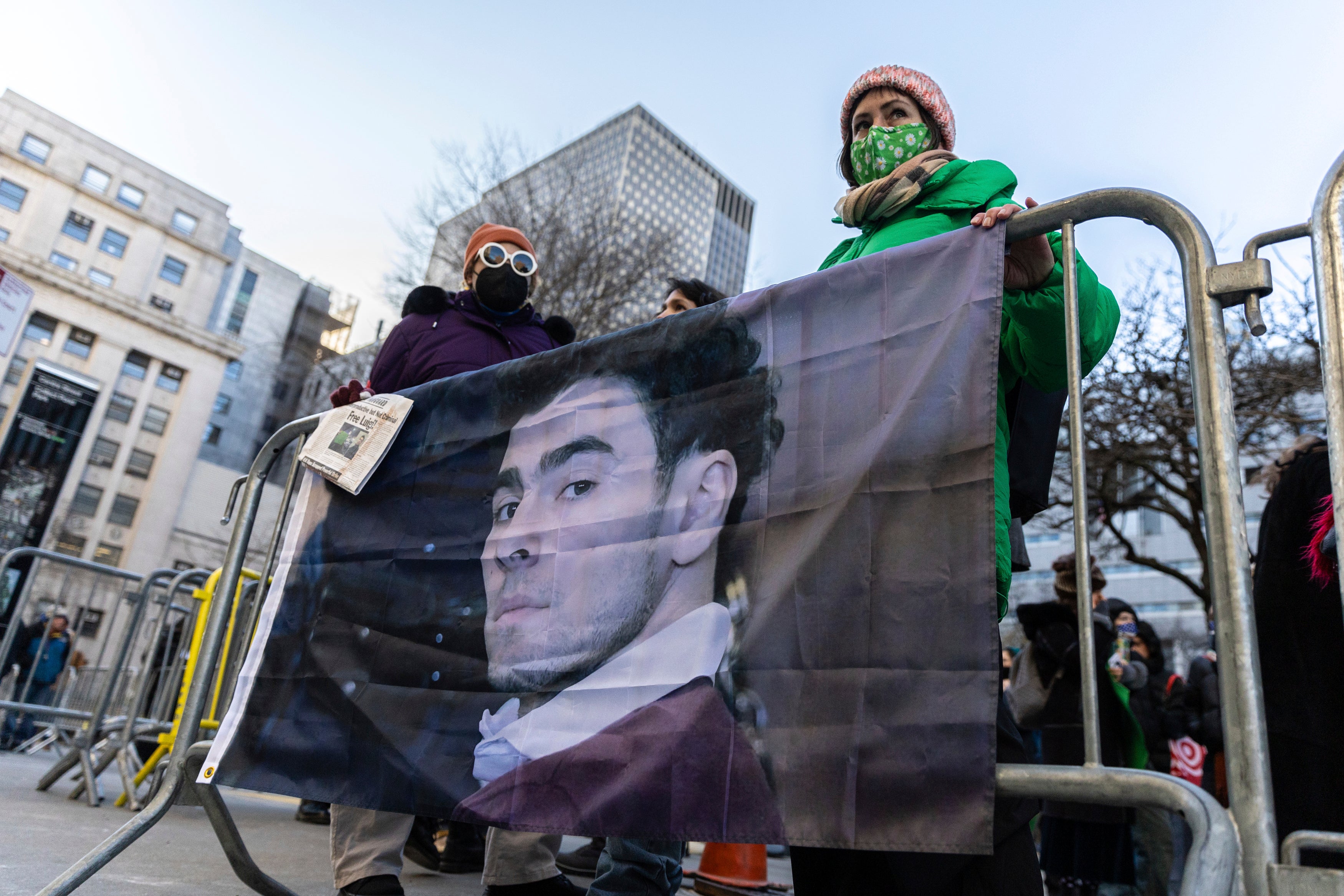 Luigi Mangione supporters stand outside the Supreme Court in New York this month.