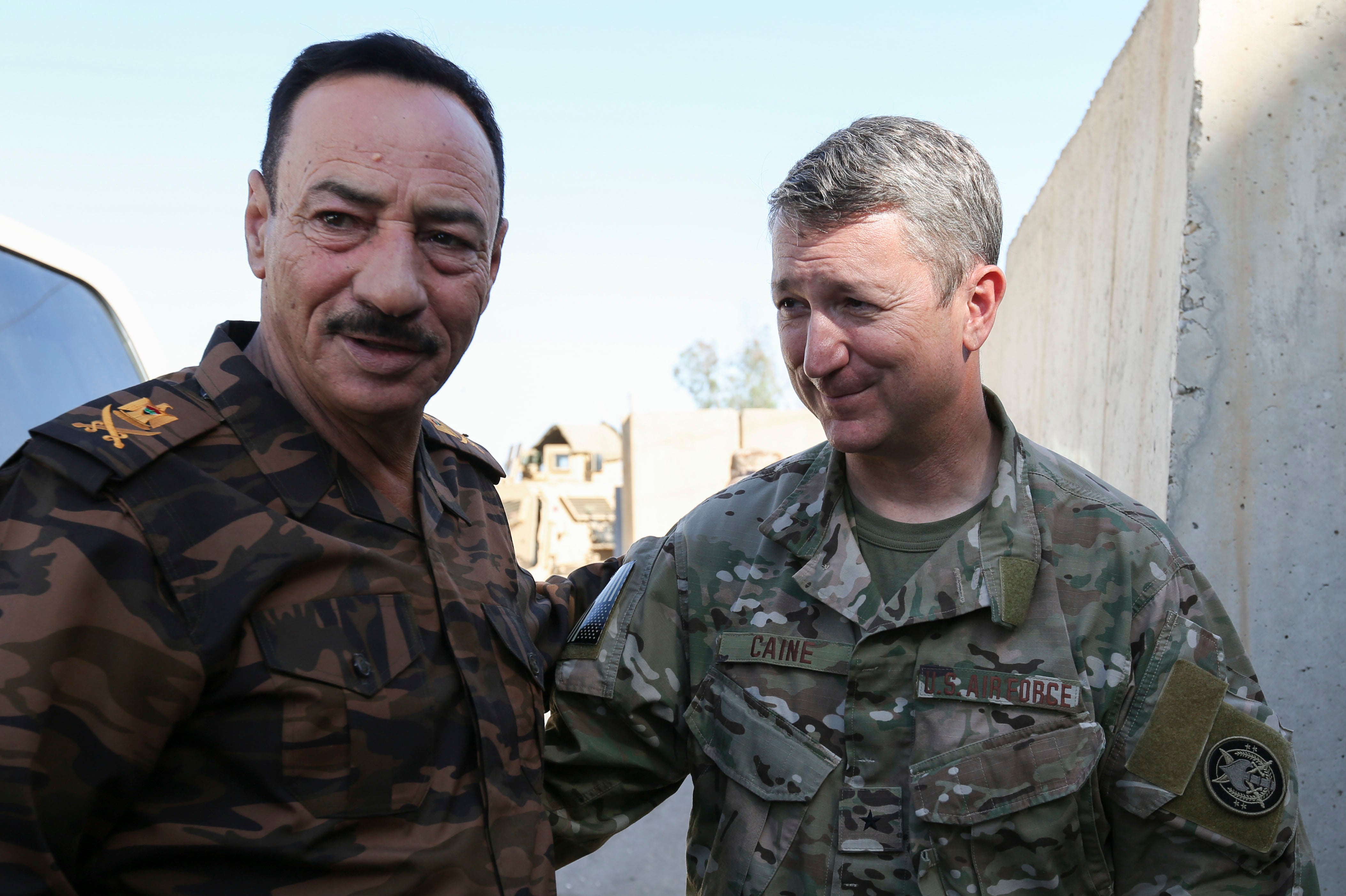 Air Force General Daniel Caine, right, meets with Ninewa Operational Center Commander, Major General Najim, in Mosul, Iraq, in 2018. Caine is Trump’s nominee to take over the role