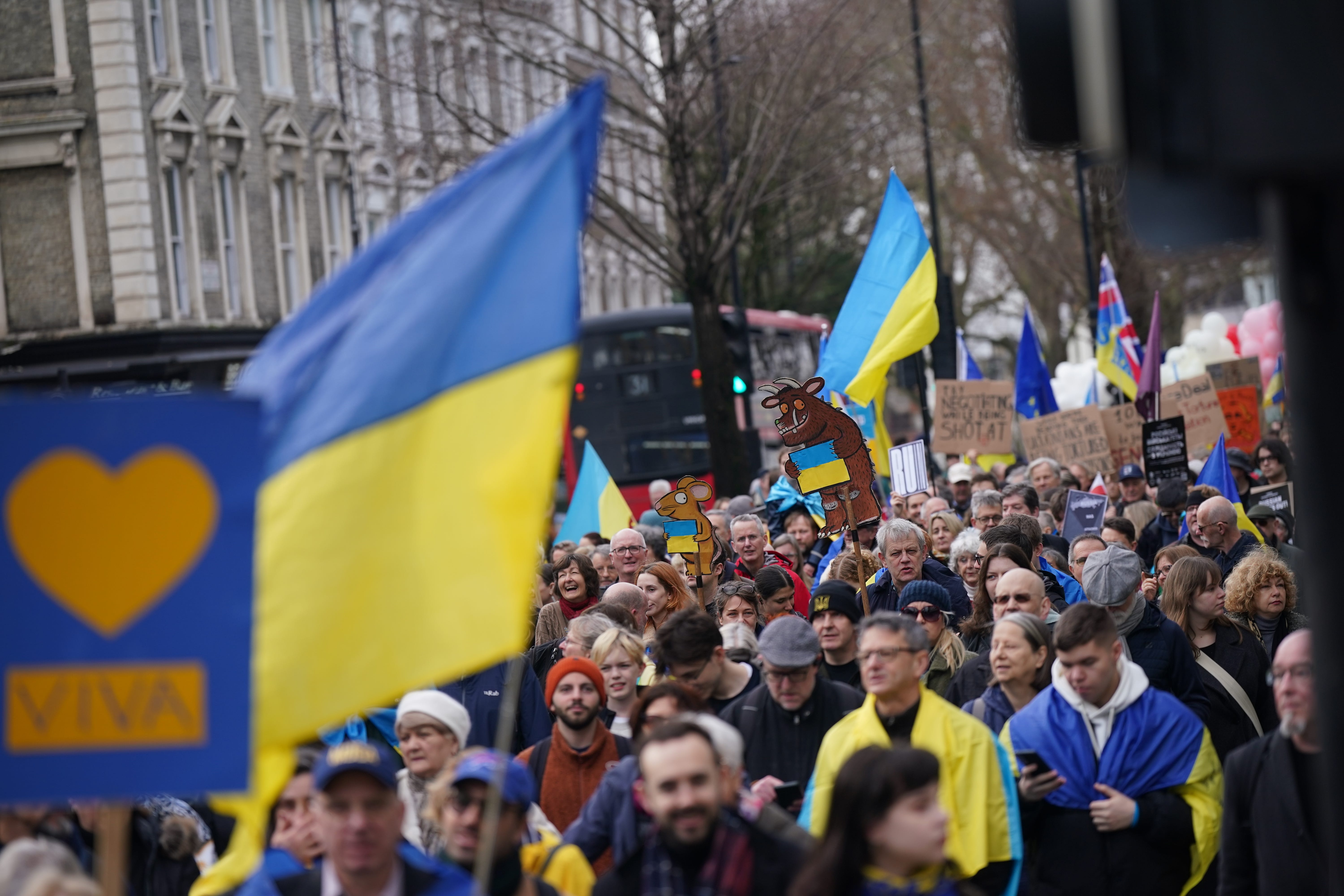 People taking part in a march from the St Volodymyr statue to the Russian embassy in central London (Yui Mok/PA)