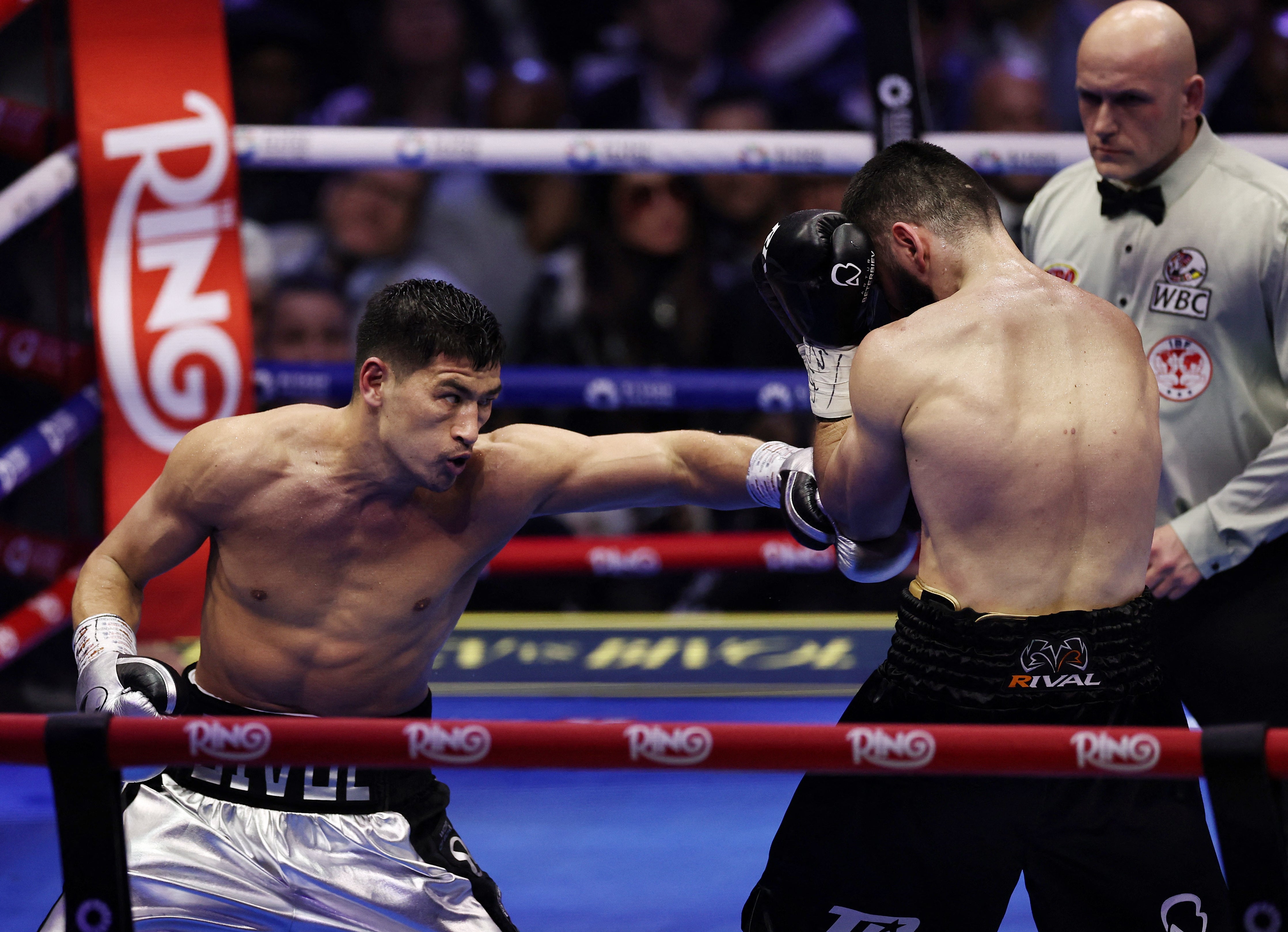 Dmitry Bivol (left) outpointed Artur Beterbiev with an inspired performance in February