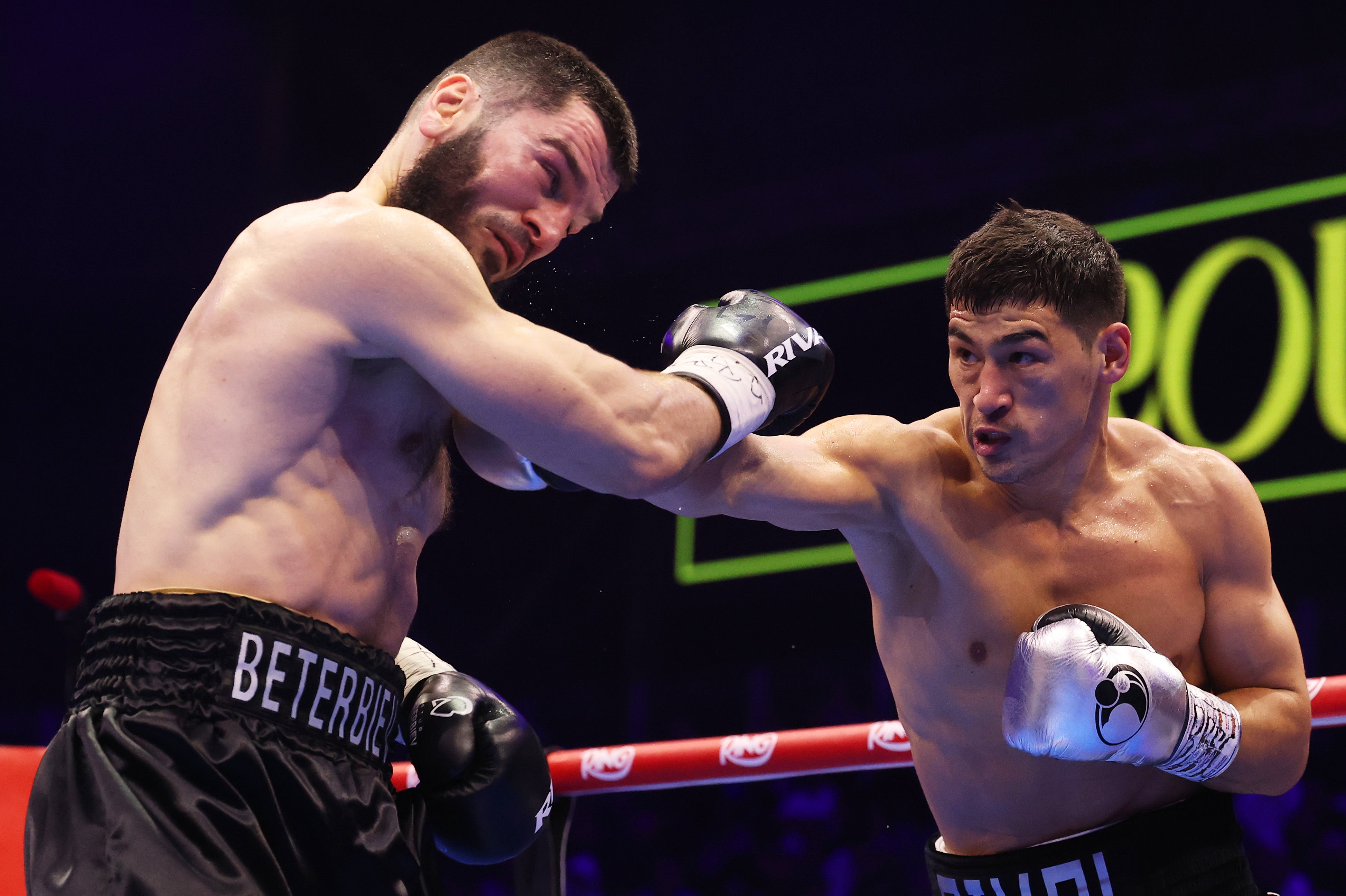 Dmitry Bivol, right, started strong in his rematch with Artur Beterbiev