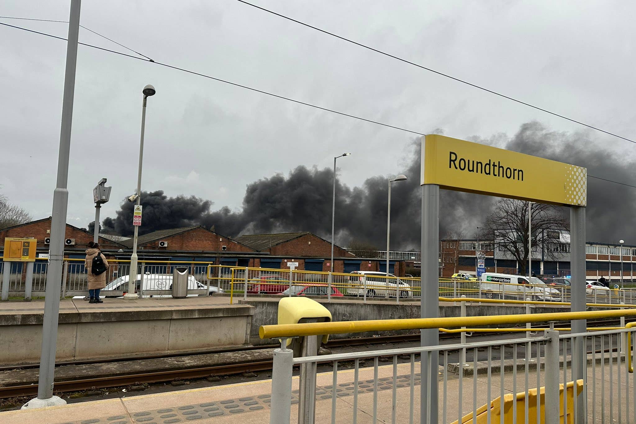 The fire broke out on an industrial site in Manchester close to Wythenshawe Hospital (@marcusreeves73/X)